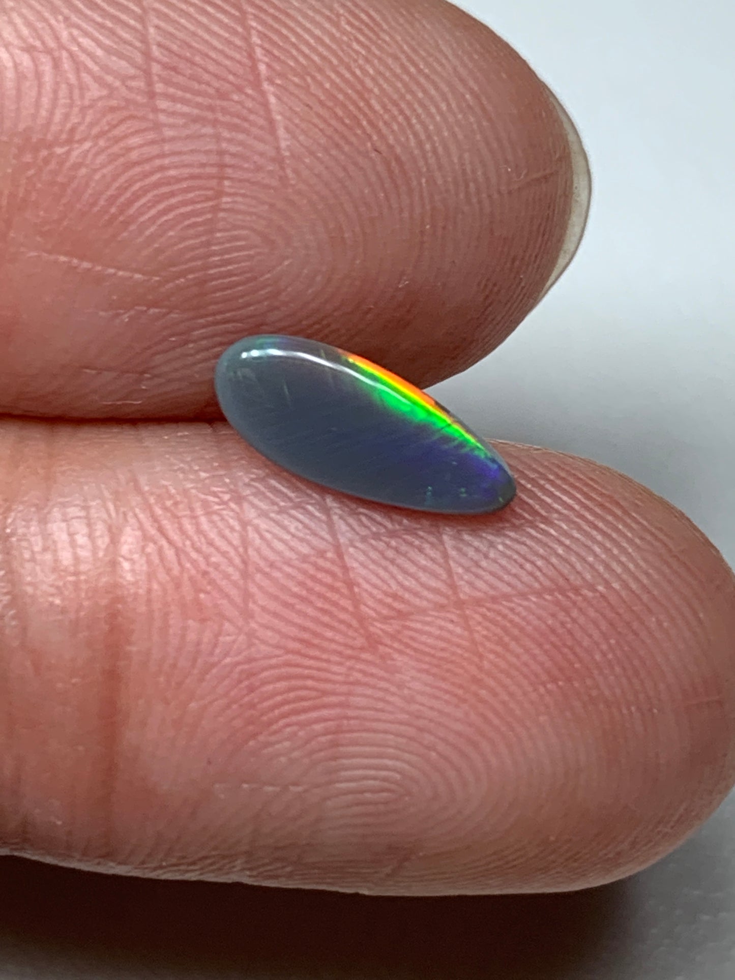 Electric Flashes. Lightning Ridge Black Opal. 0.43 Ct