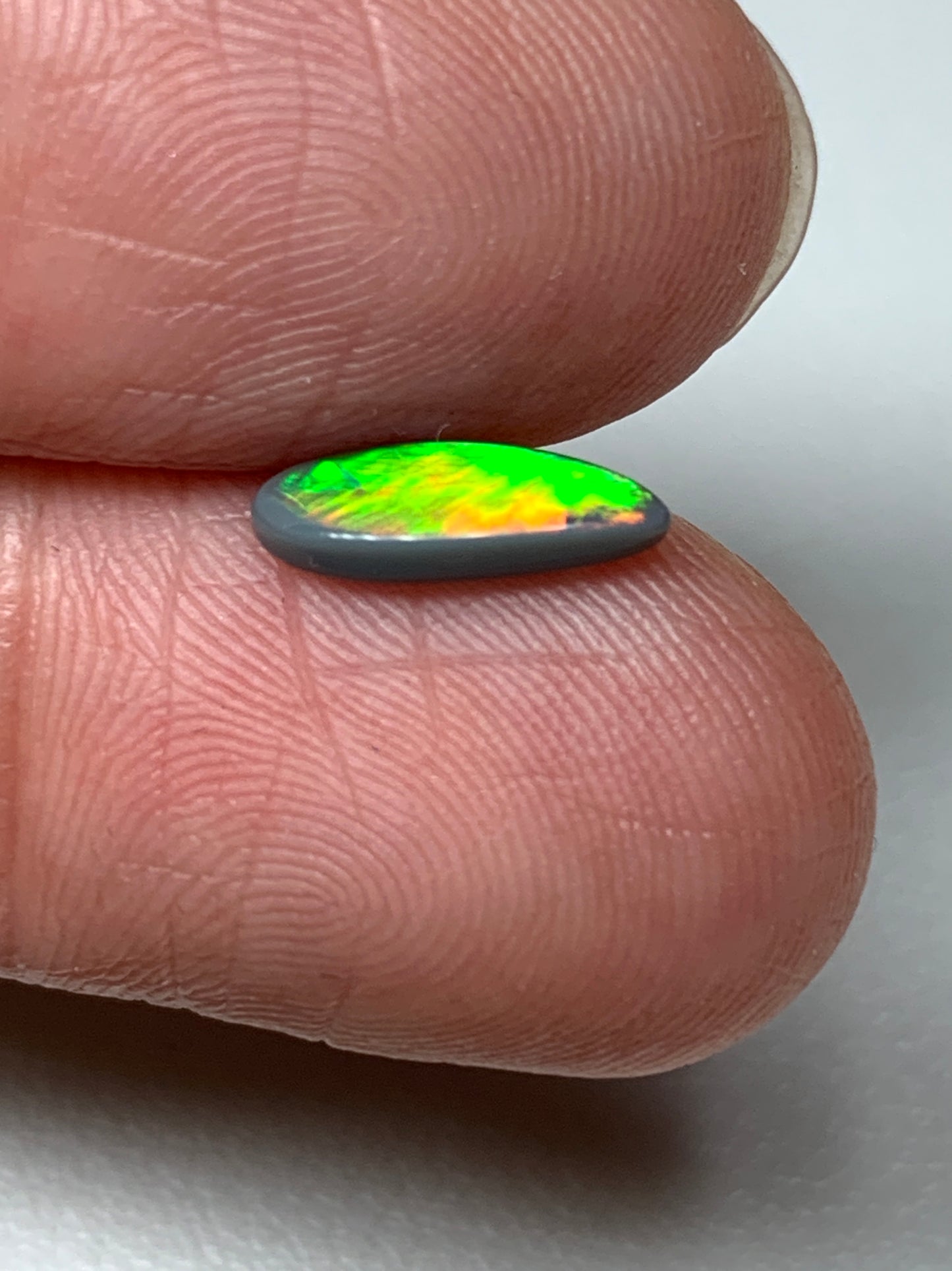 Electric Flashes. Lightning Ridge Black Opal. 0.43 Ct