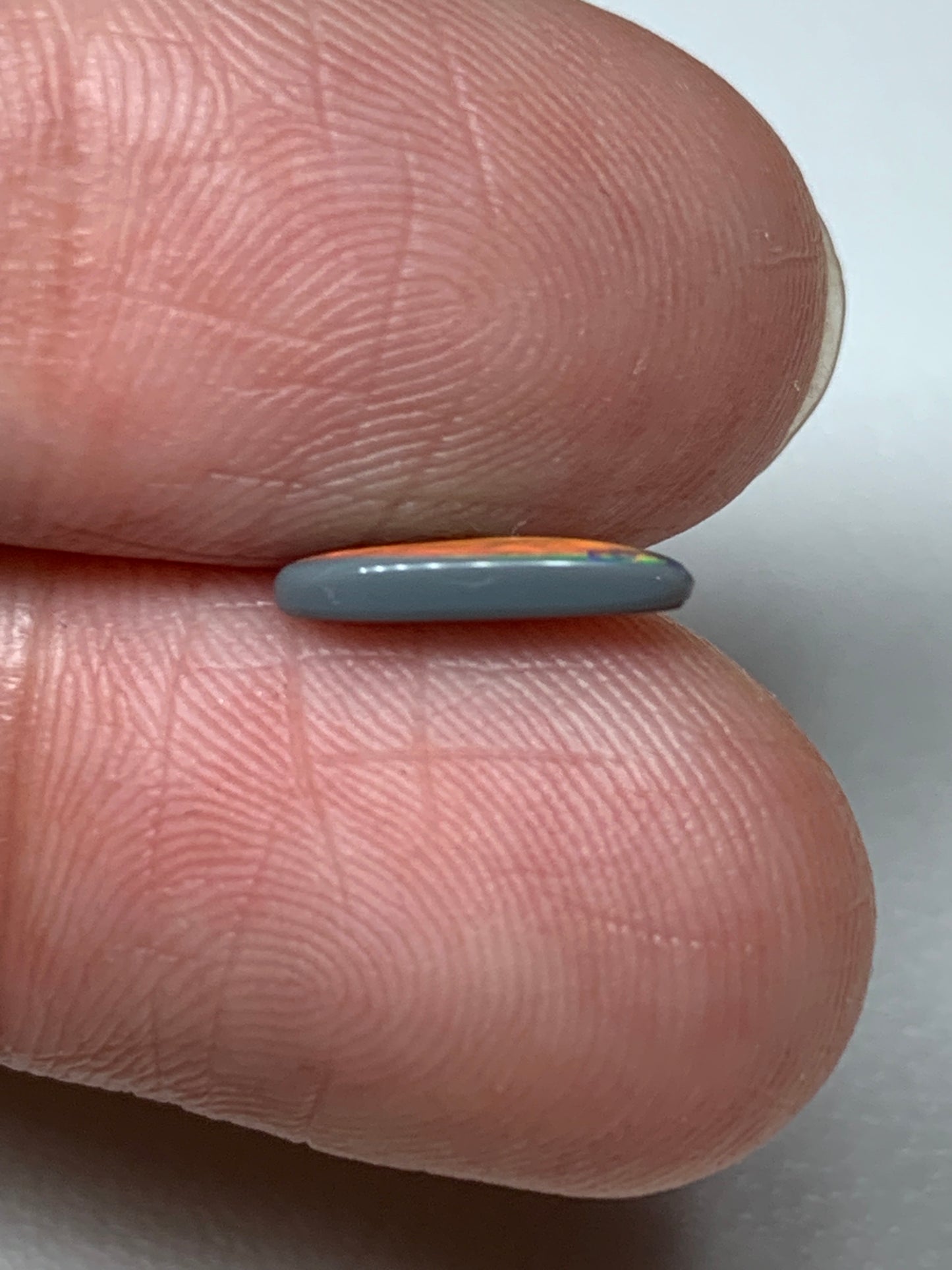 Electric Flashes. Lightning Ridge Black Opal. 0.43 Ct