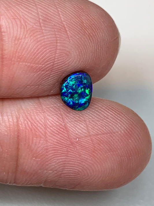 Peacock Blue. Solid Black Boulder Opal. 0.70 Ct