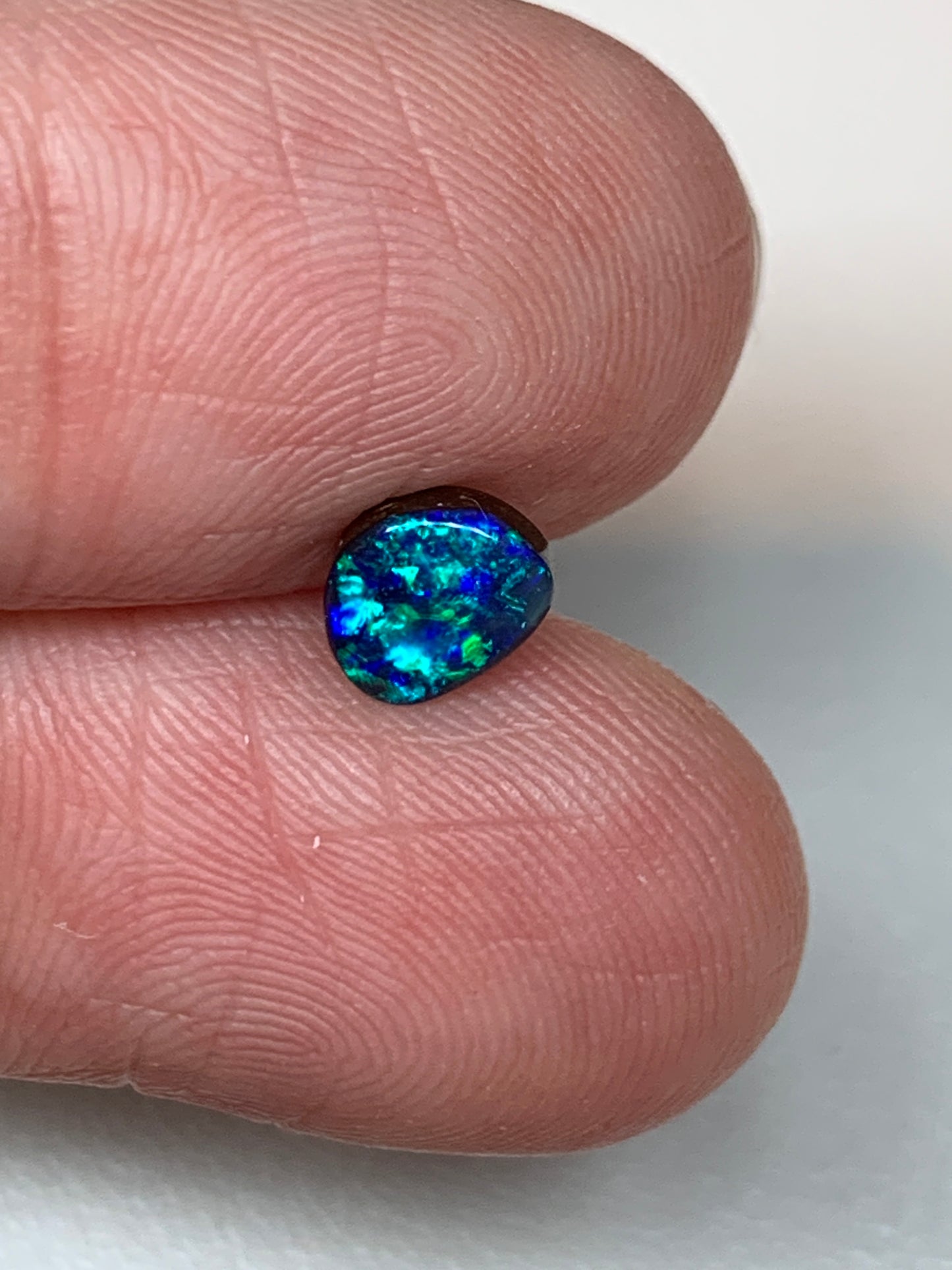 Peacock Blue. Solid Black Boulder Opal. 0.70 Ct