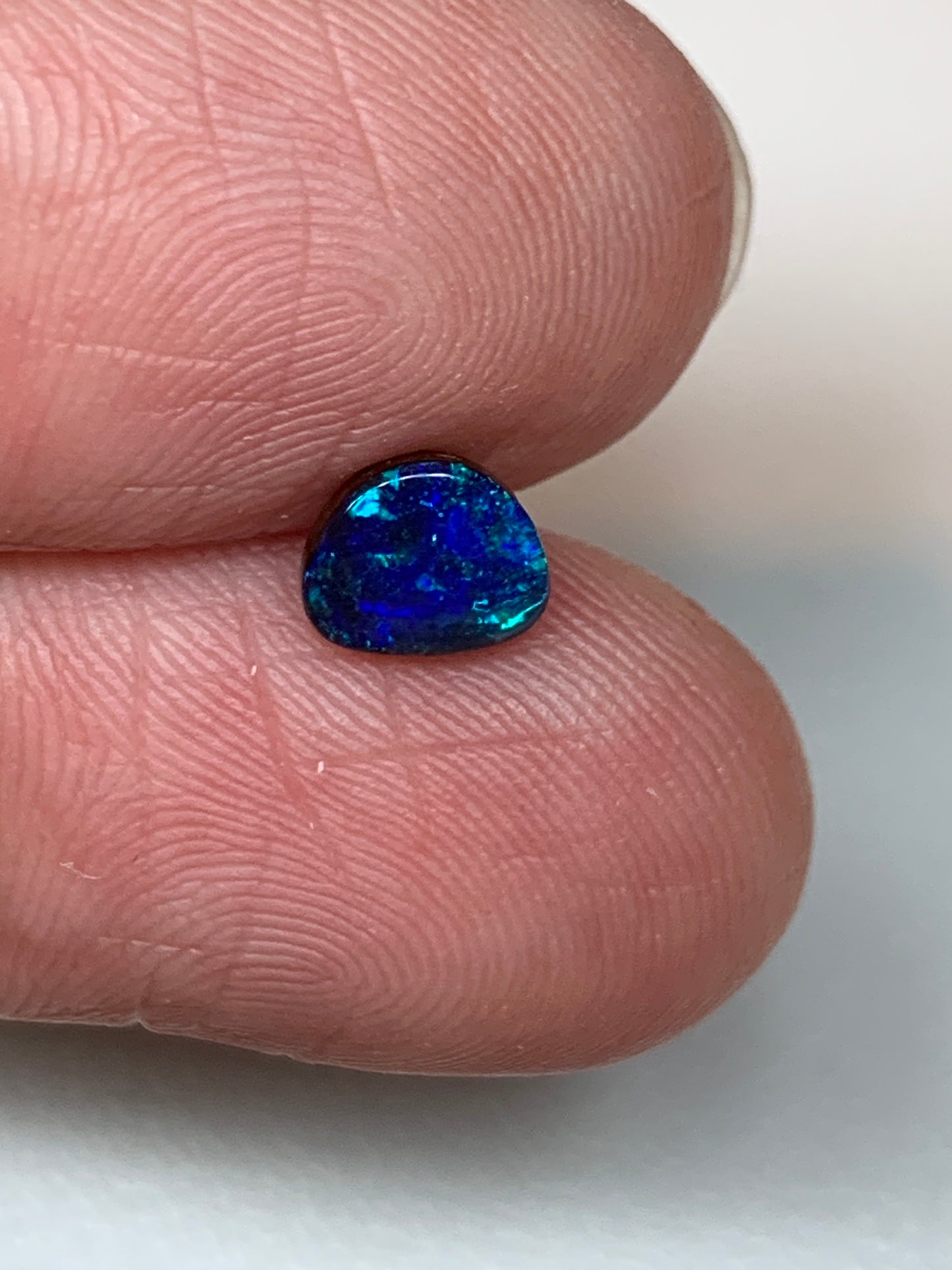 Peacock Blue. Solid Black Boulder Opal. 0.70 Ct
