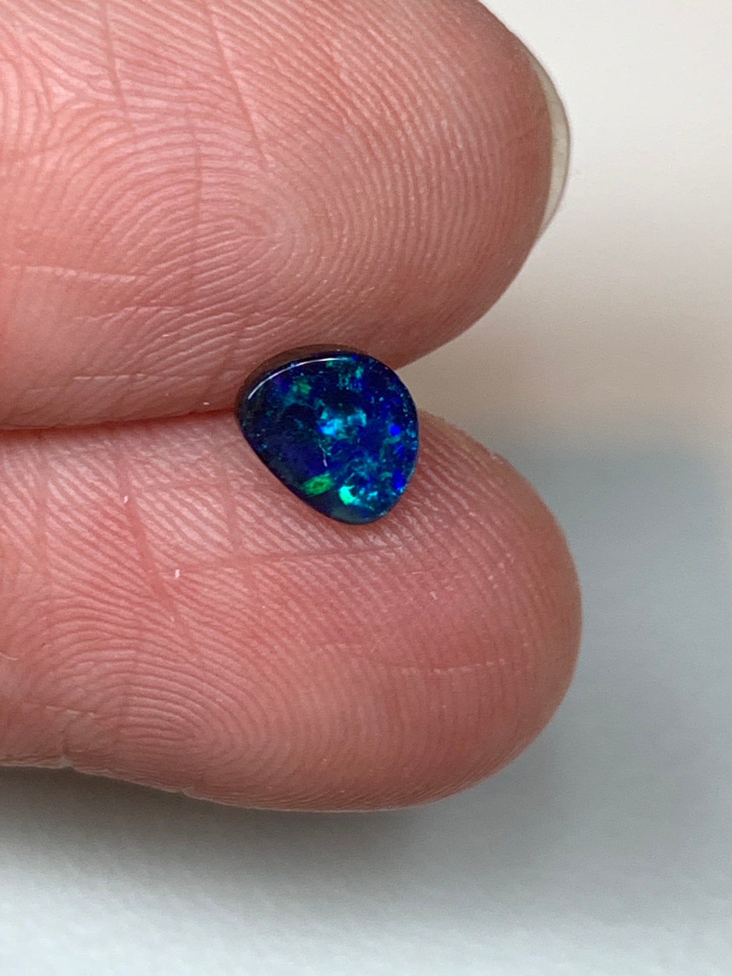 Peacock Blue. Solid Black Boulder Opal. 0.70 Ct