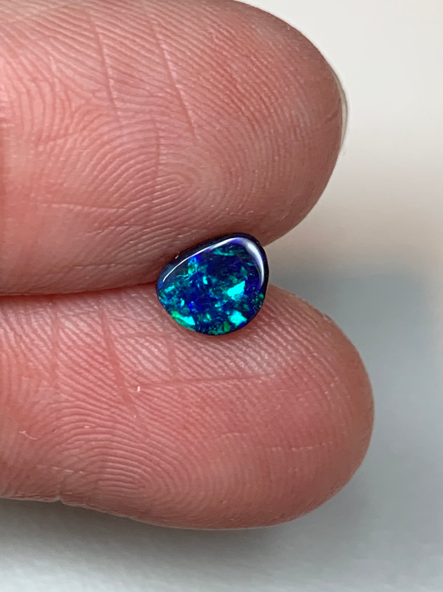 Peacock Blue. Solid Black Boulder Opal. 0.70 Ct