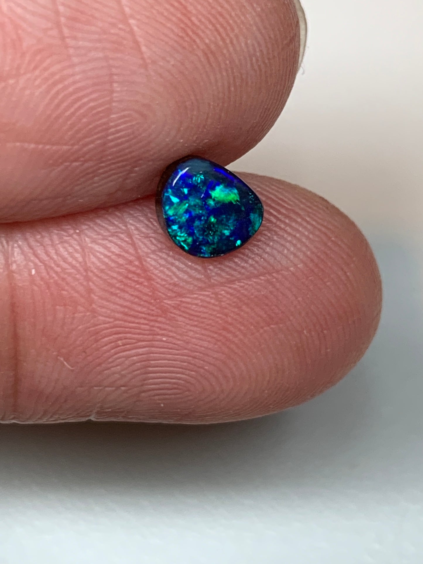 Peacock Blue. Solid Black Boulder Opal. 0.70 Ct