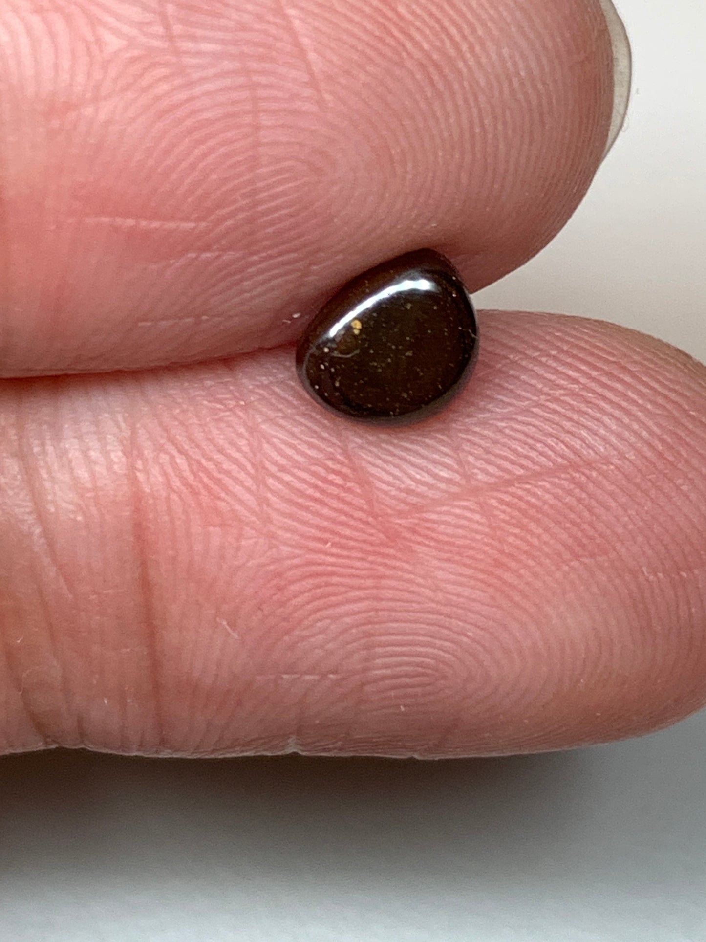 Peacock Blue. Solid Black Boulder Opal. 0.70 Ct