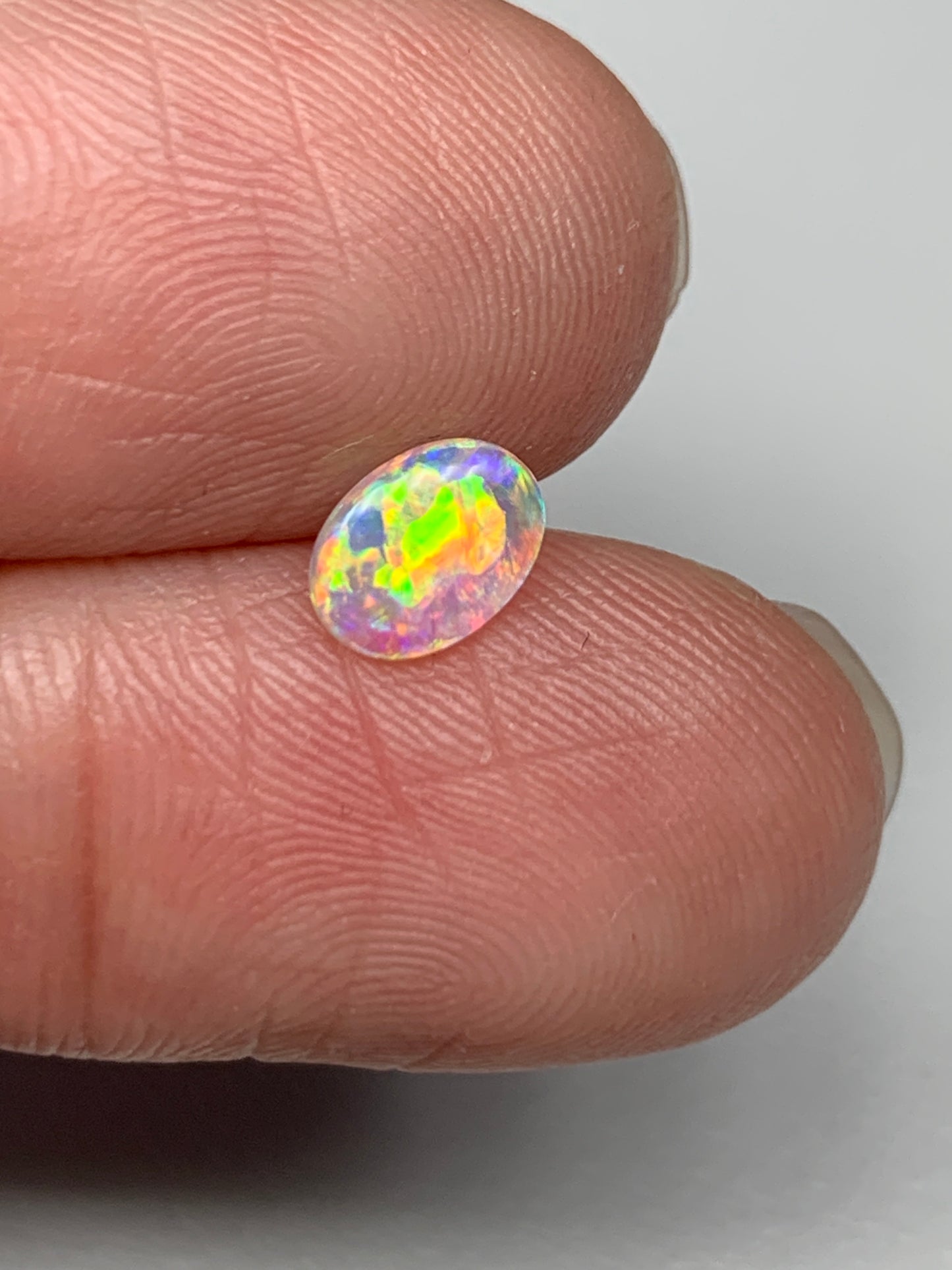 Flower Garden. Lightning Ridge Solid Crystal Opal. 0.31 Ct