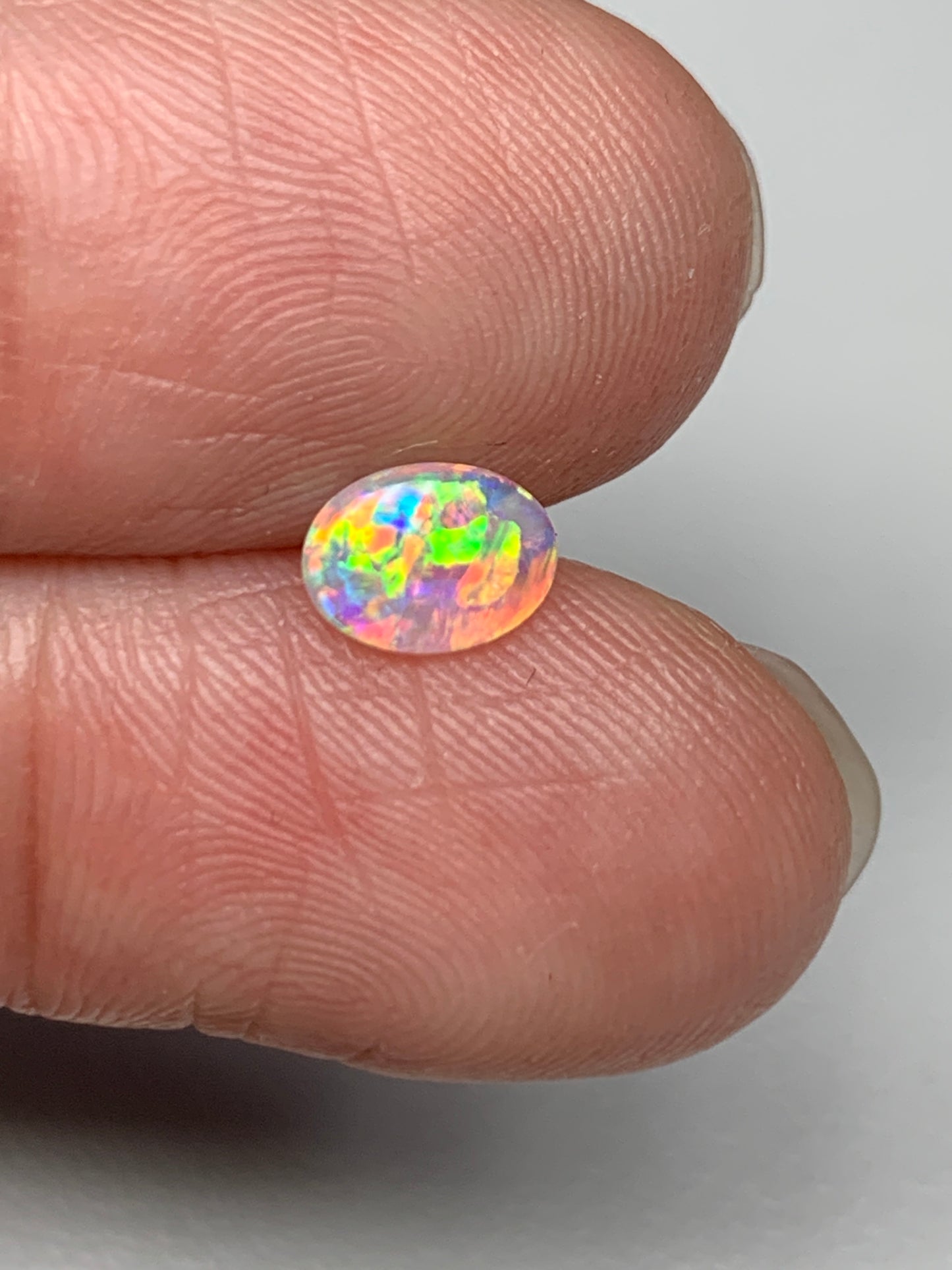 Flower Garden. Lightning Ridge Solid Crystal Opal. 0.31 Ct
