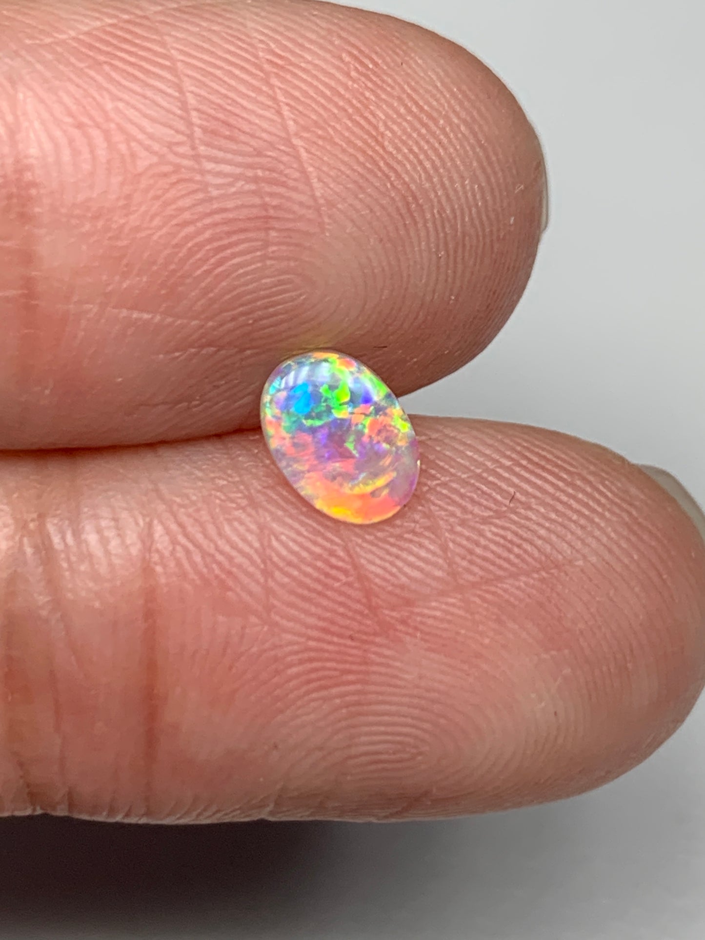 Flower Garden. Lightning Ridge Solid Crystal Opal. 0.31 Ct