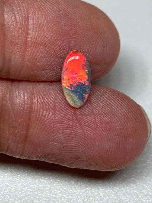 Red Fire. Lightning Ridge Solid Black Opal. 0.68 Ct