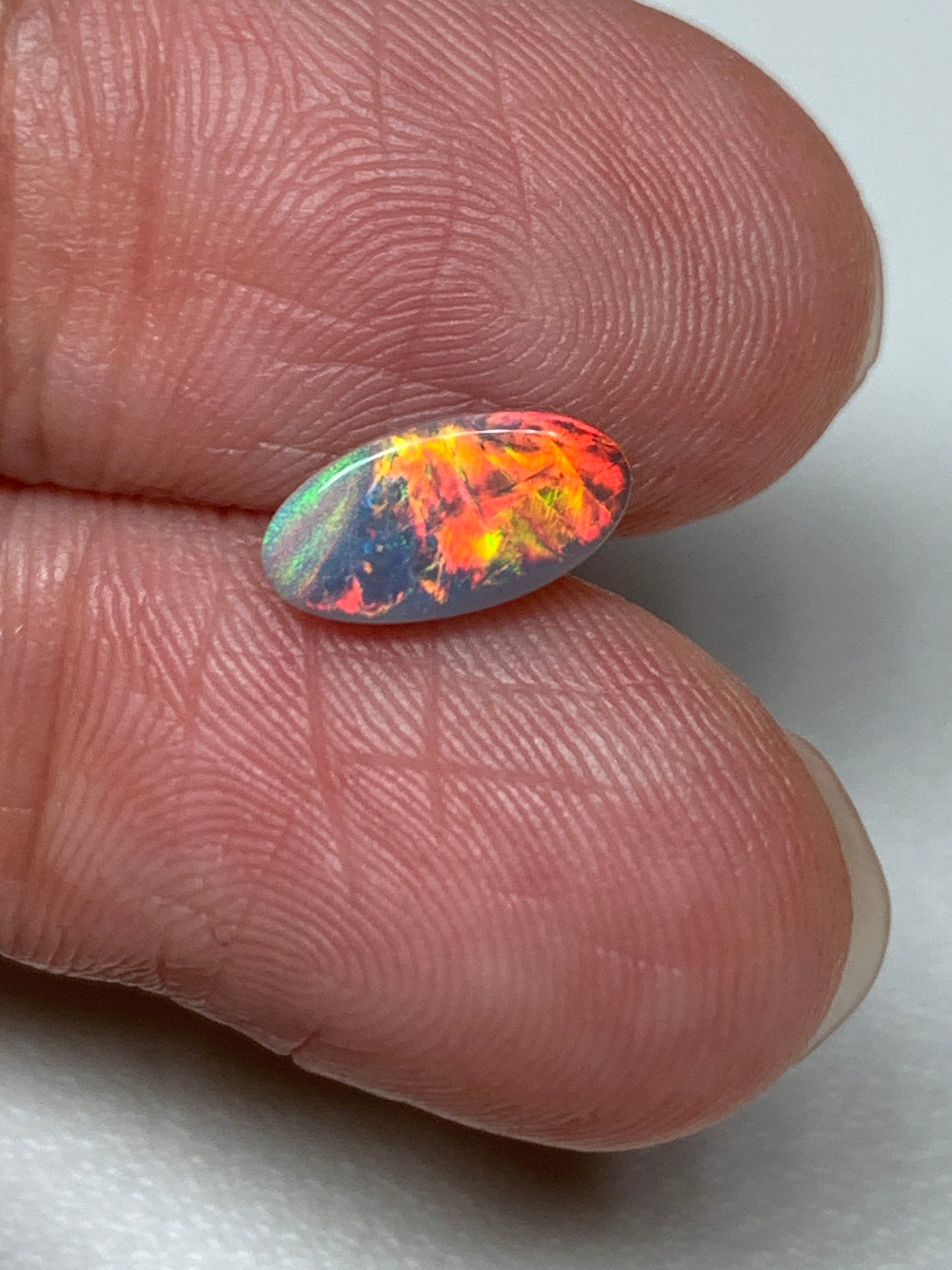 Red Fire. Lightning Ridge Solid Black Opal. 0.68 Ct