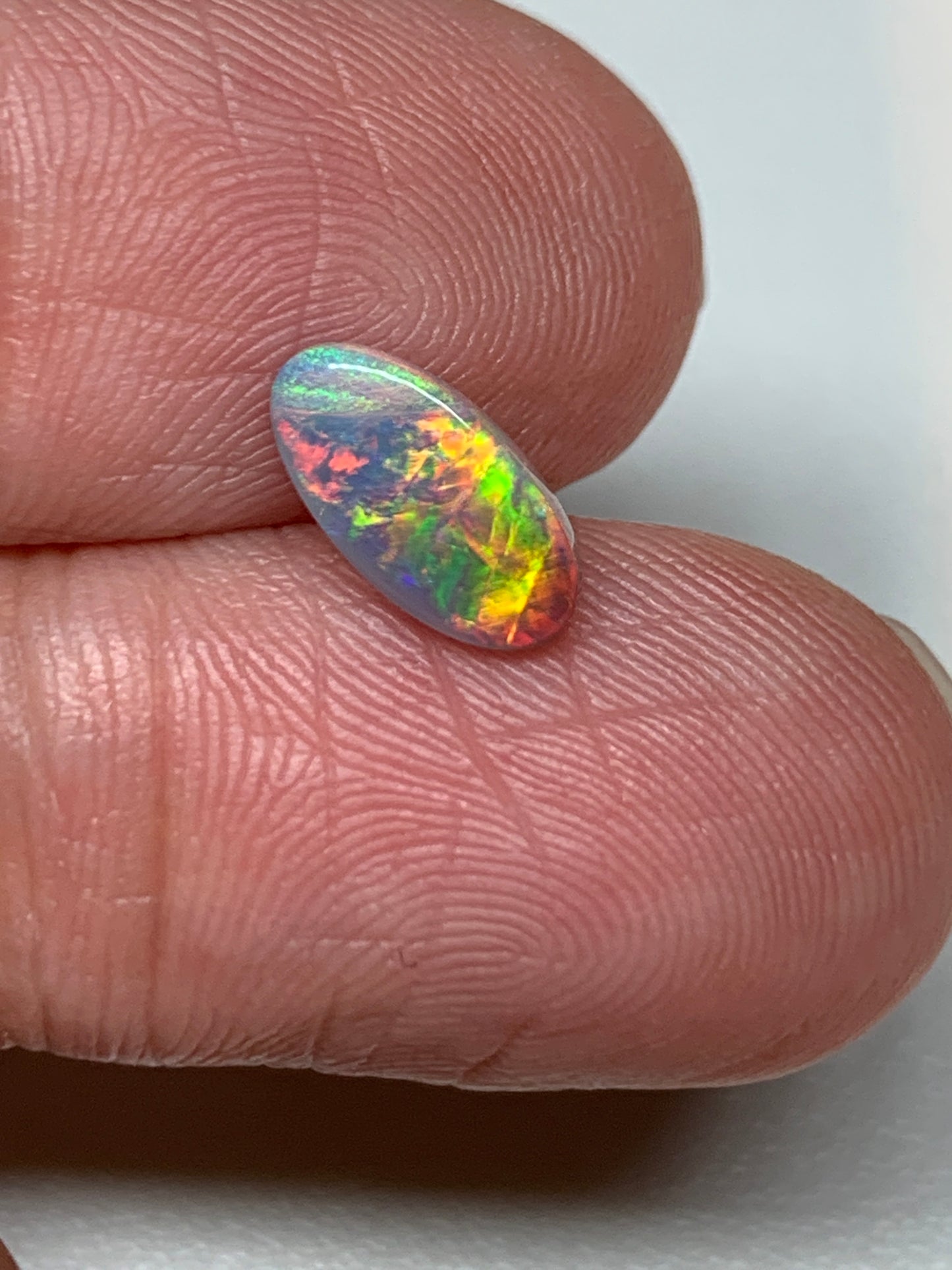 Red Fire. Lightning Ridge Solid Black Opal. 0.68 Ct