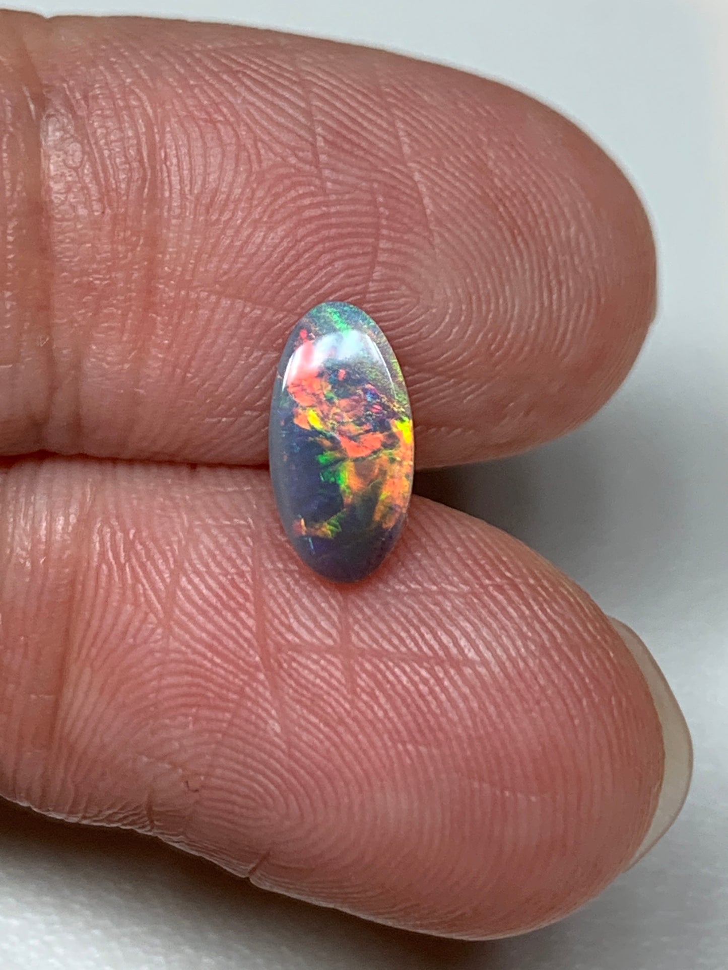 Red Fire. Lightning Ridge Solid Black Opal. 0.68 Ct