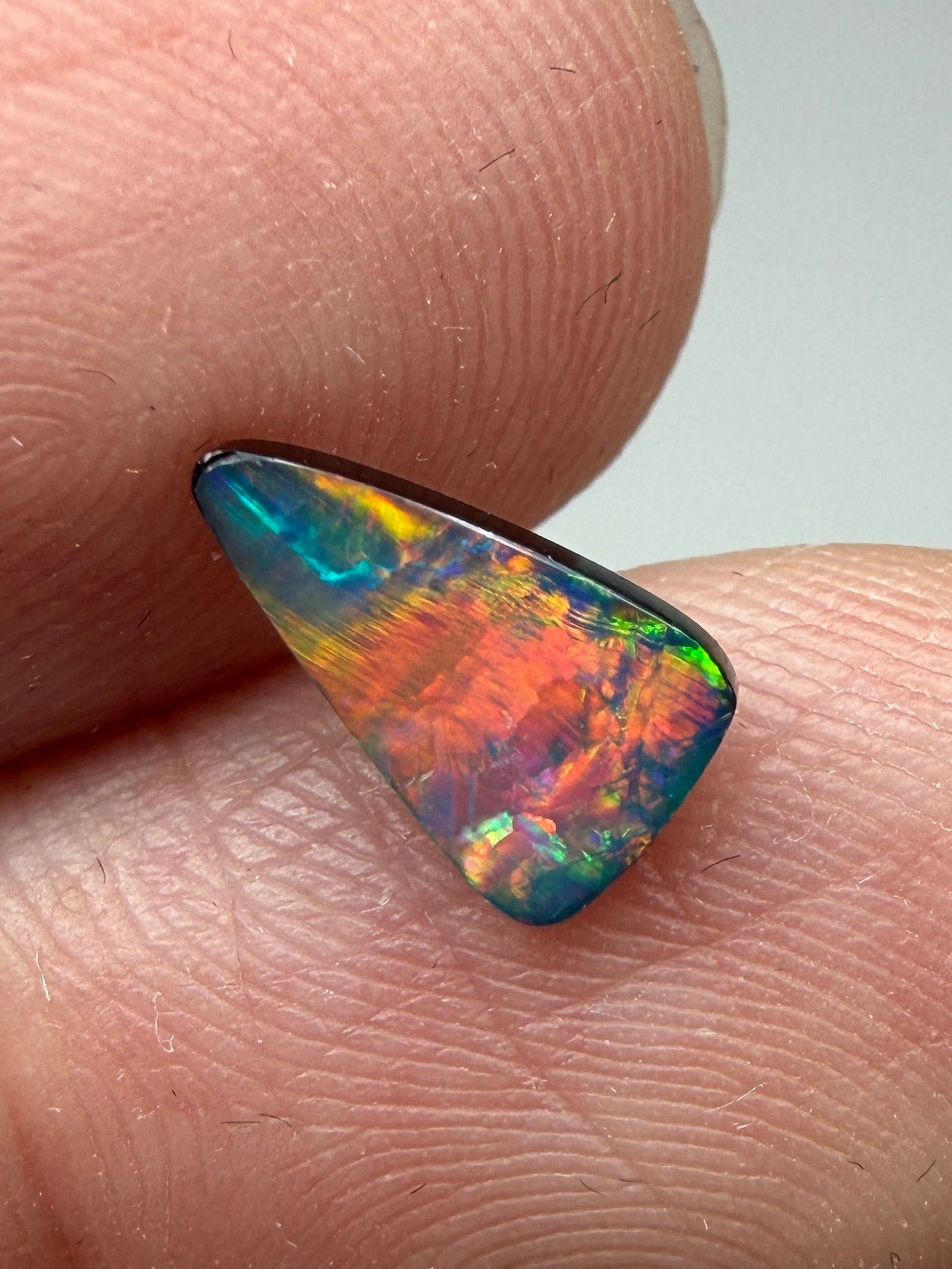 Flashy Face. Lightning Ridge Doublet Black Opal. 0.65 Ct