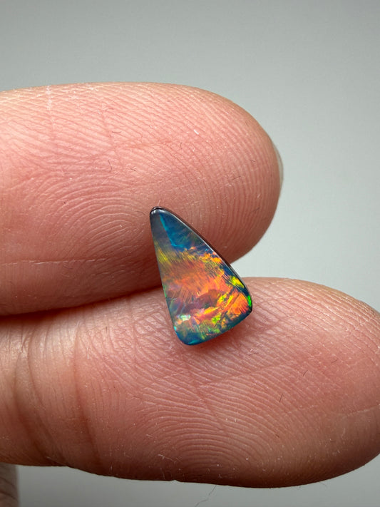 Flashy Face. Lightning Ridge Doublet Black Opal. 0.65 Ct