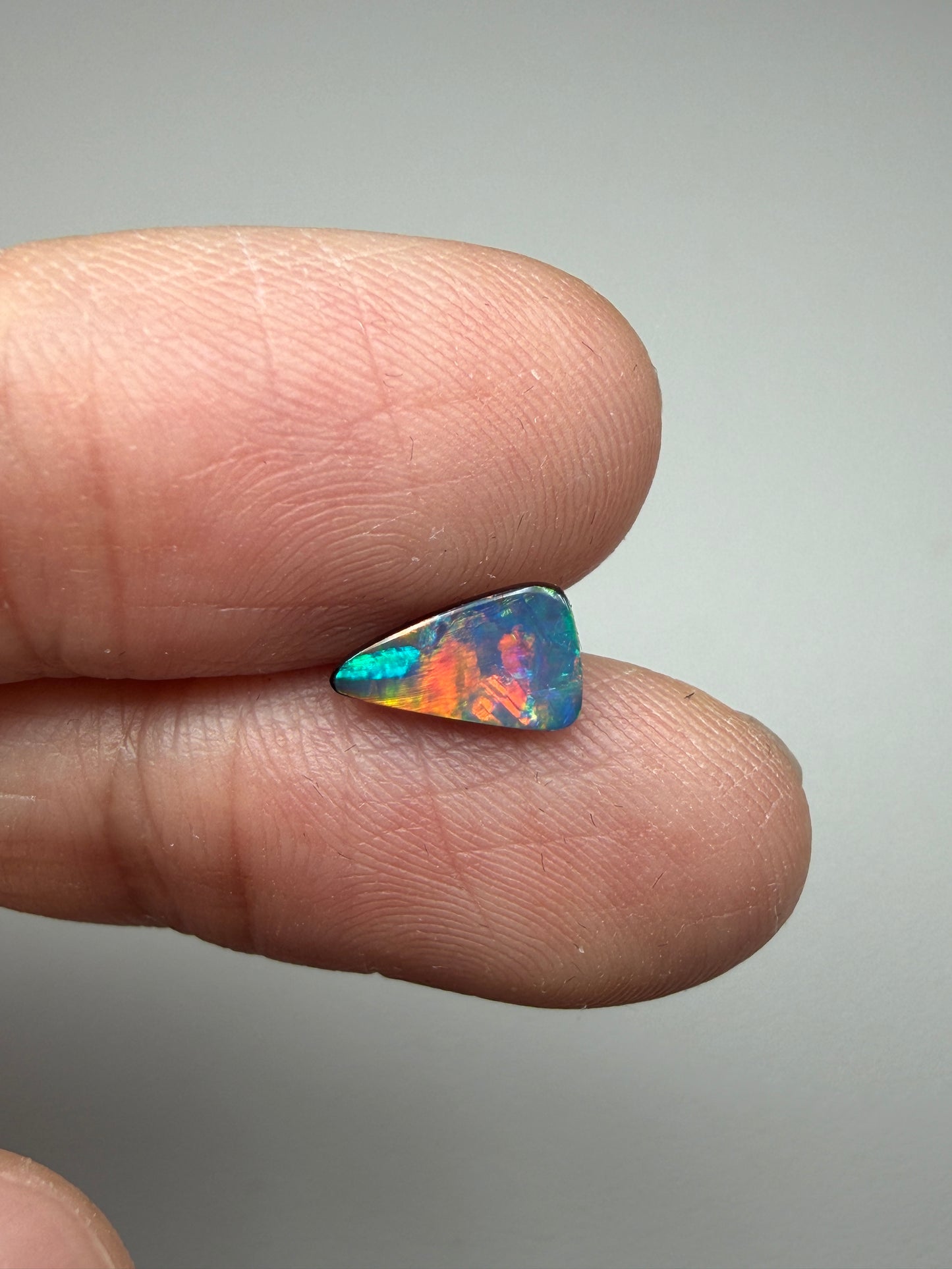 Flashy Face. Lightning Ridge Doublet Black Opal. 0.65 Ct
