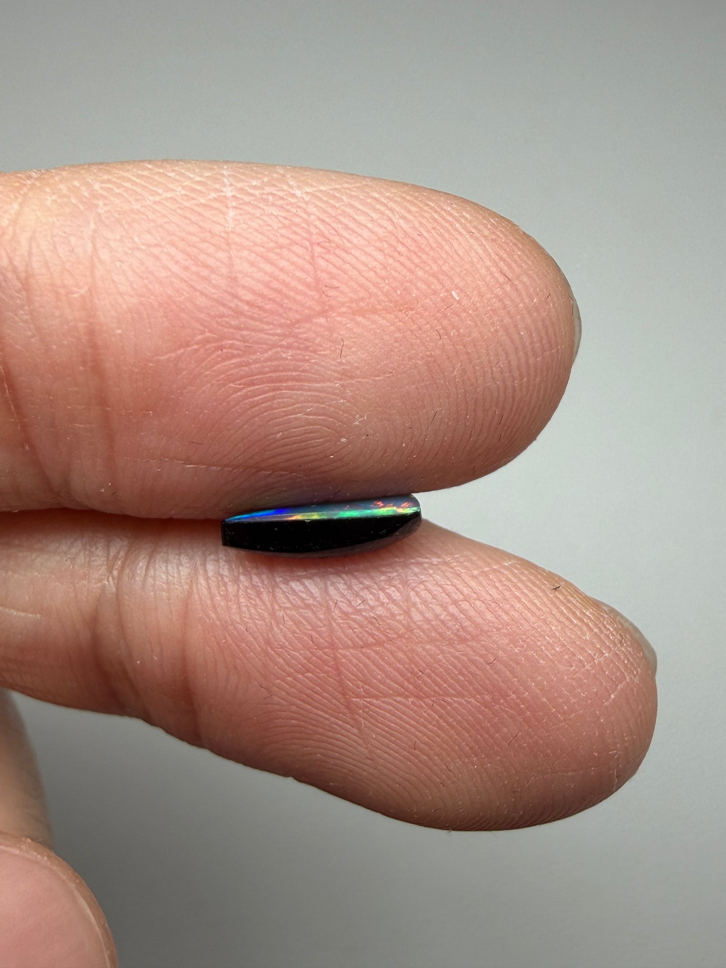 Flashy Face. Lightning Ridge Doublet Black Opal. 0.65 Ct
