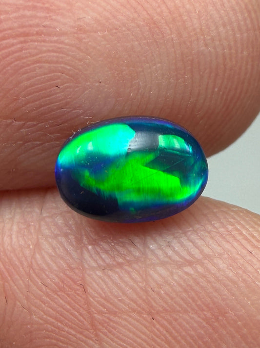 Green Glow. Lightning Ridge Doublet Black Opal. 0.80 Ct
