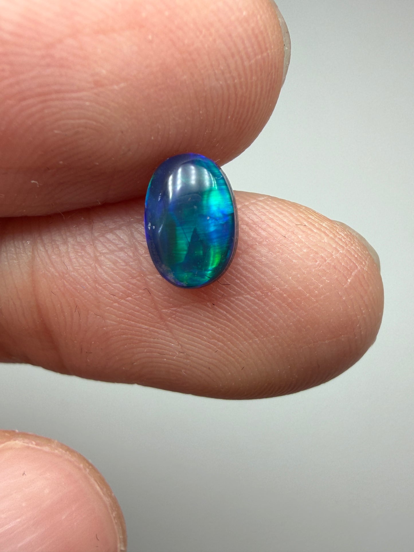 Green Glow. Lightning Ridge Doublet Black Opal. 0.80 Ct
