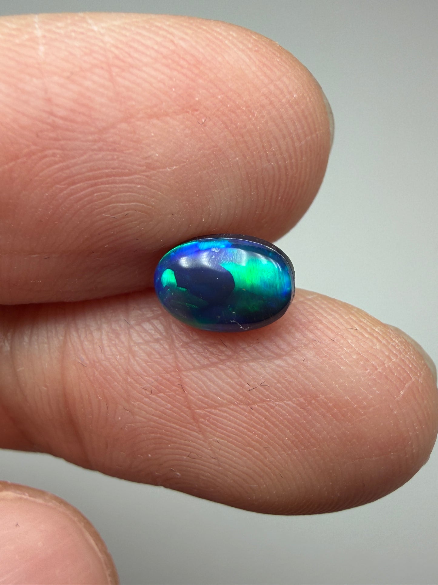Green Glow. Lightning Ridge Doublet Black Opal. 0.80 Ct