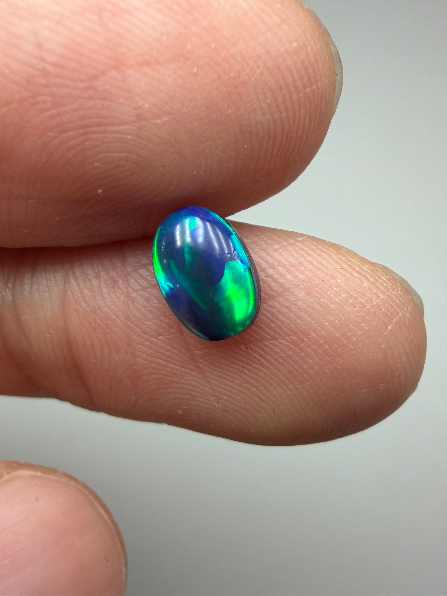 Green Glow. Lightning Ridge Doublet Black Opal. 0.80 Ct