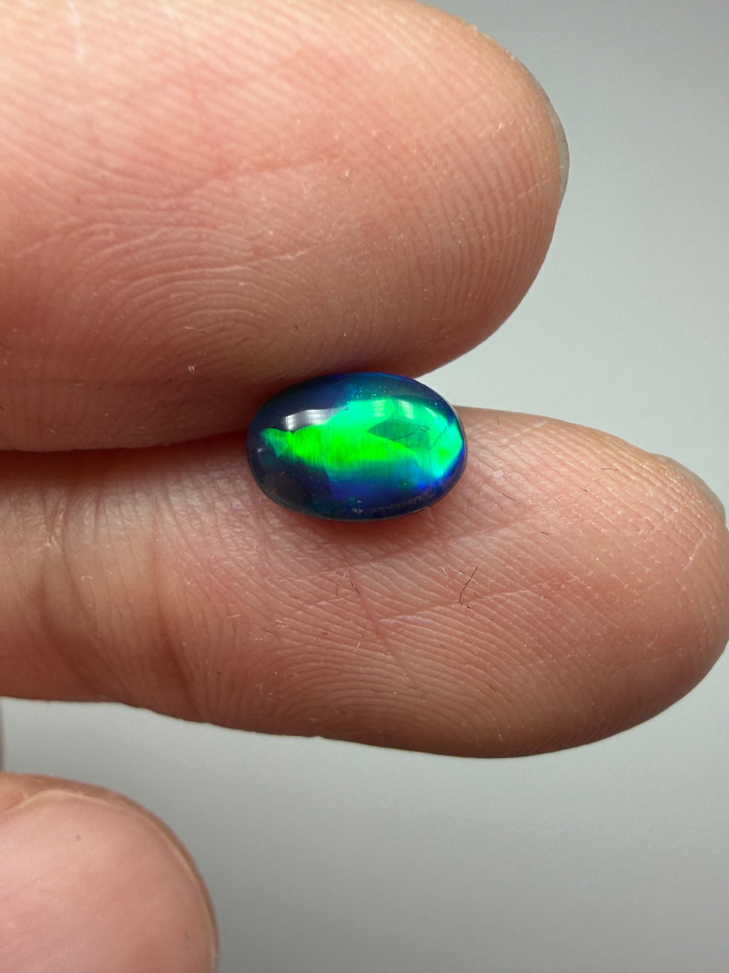 Green Glow. Lightning Ridge Doublet Black Opal. 0.80 Ct