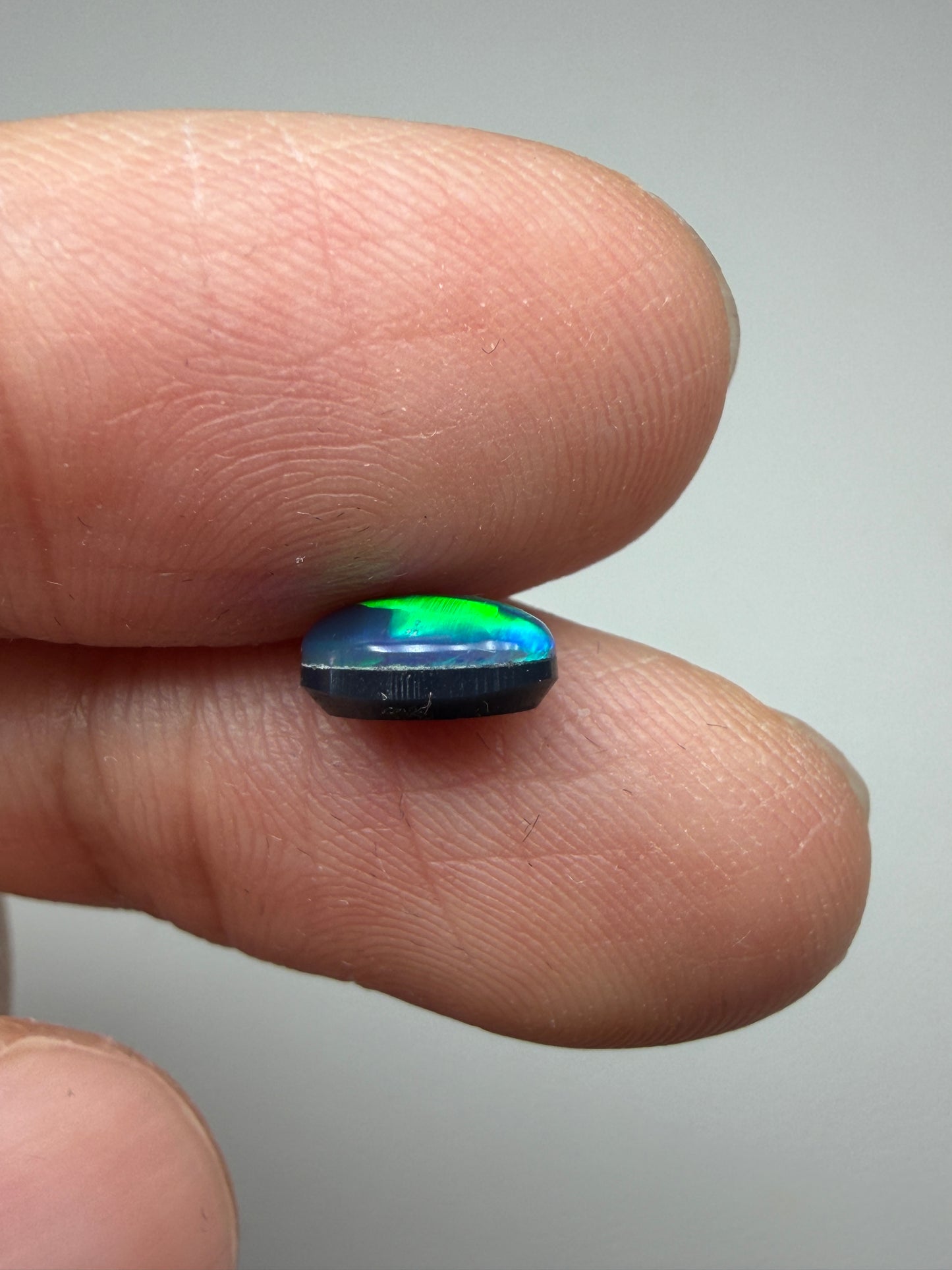 Green Glow. Lightning Ridge Doublet Black Opal. 0.80 Ct