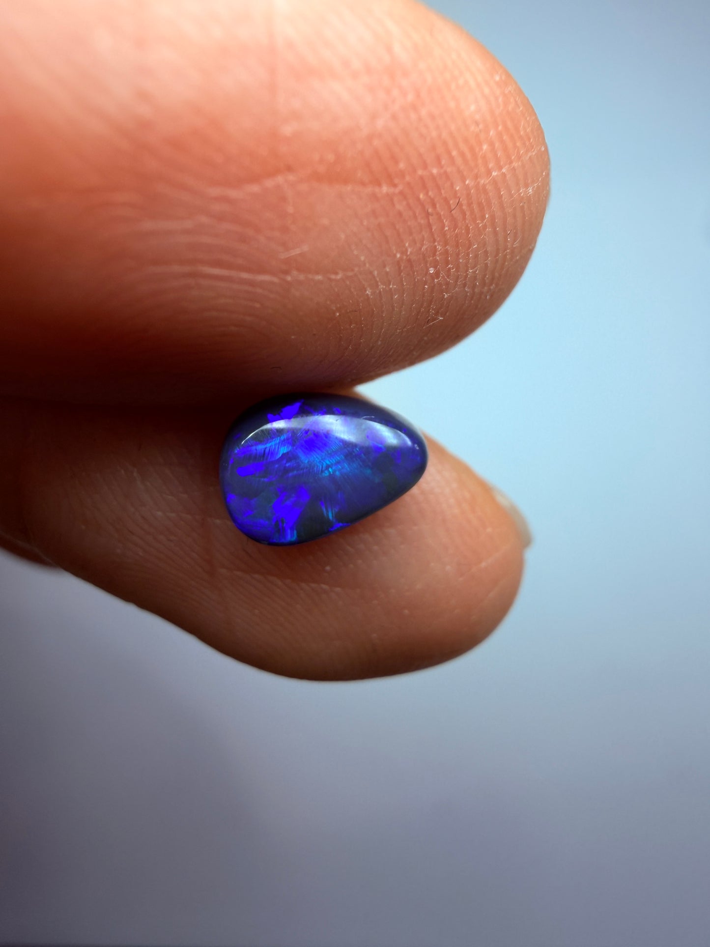 Purple Pip. Lightning Ridge Solid Black Opal. 0.80 Ct