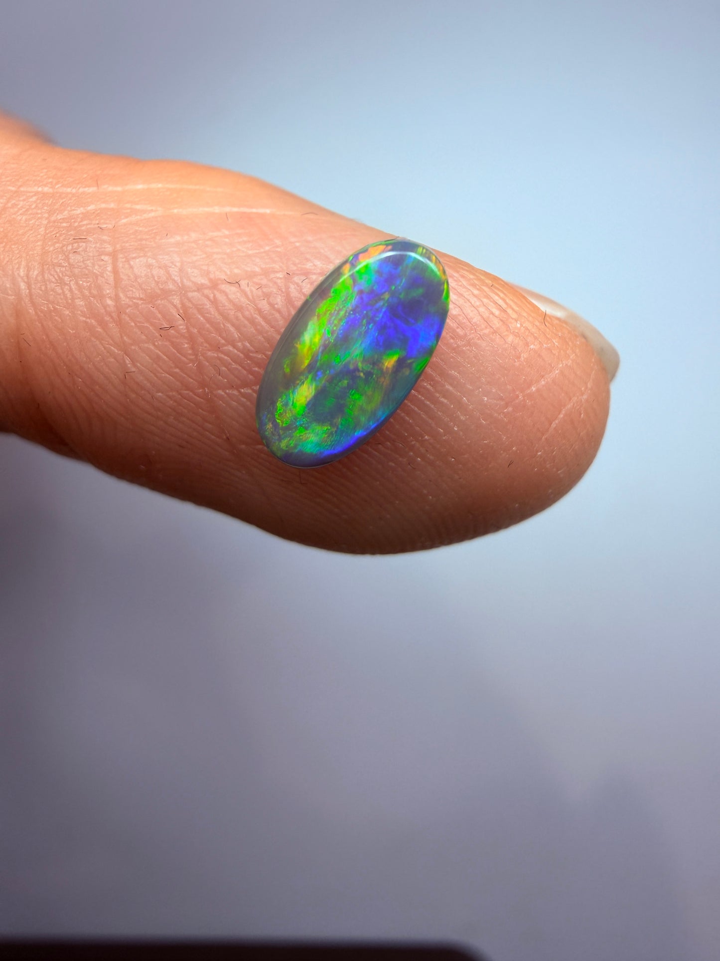 Garden Setting. Lightning Ridge Solid Black Opal. 0.48 Ct