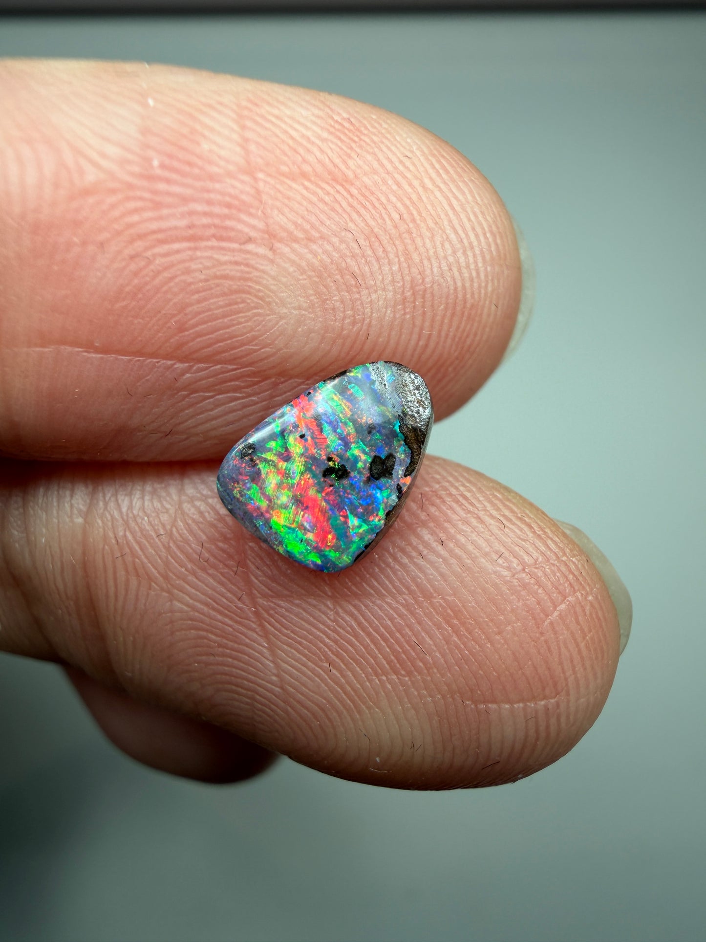 Red Display. Solid Boulder Opal. 0.98 Ct