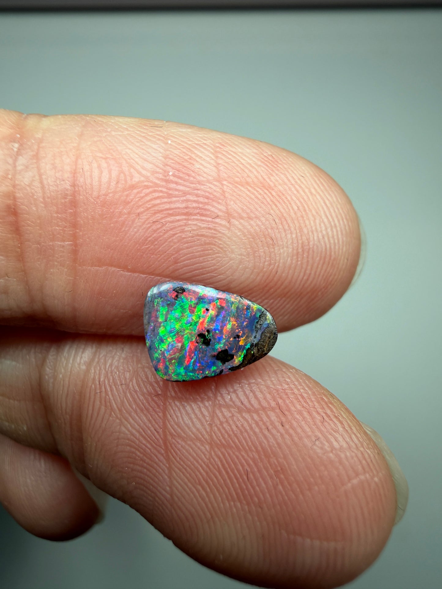 Red Display. Solid Boulder Opal. 0.98 Ct