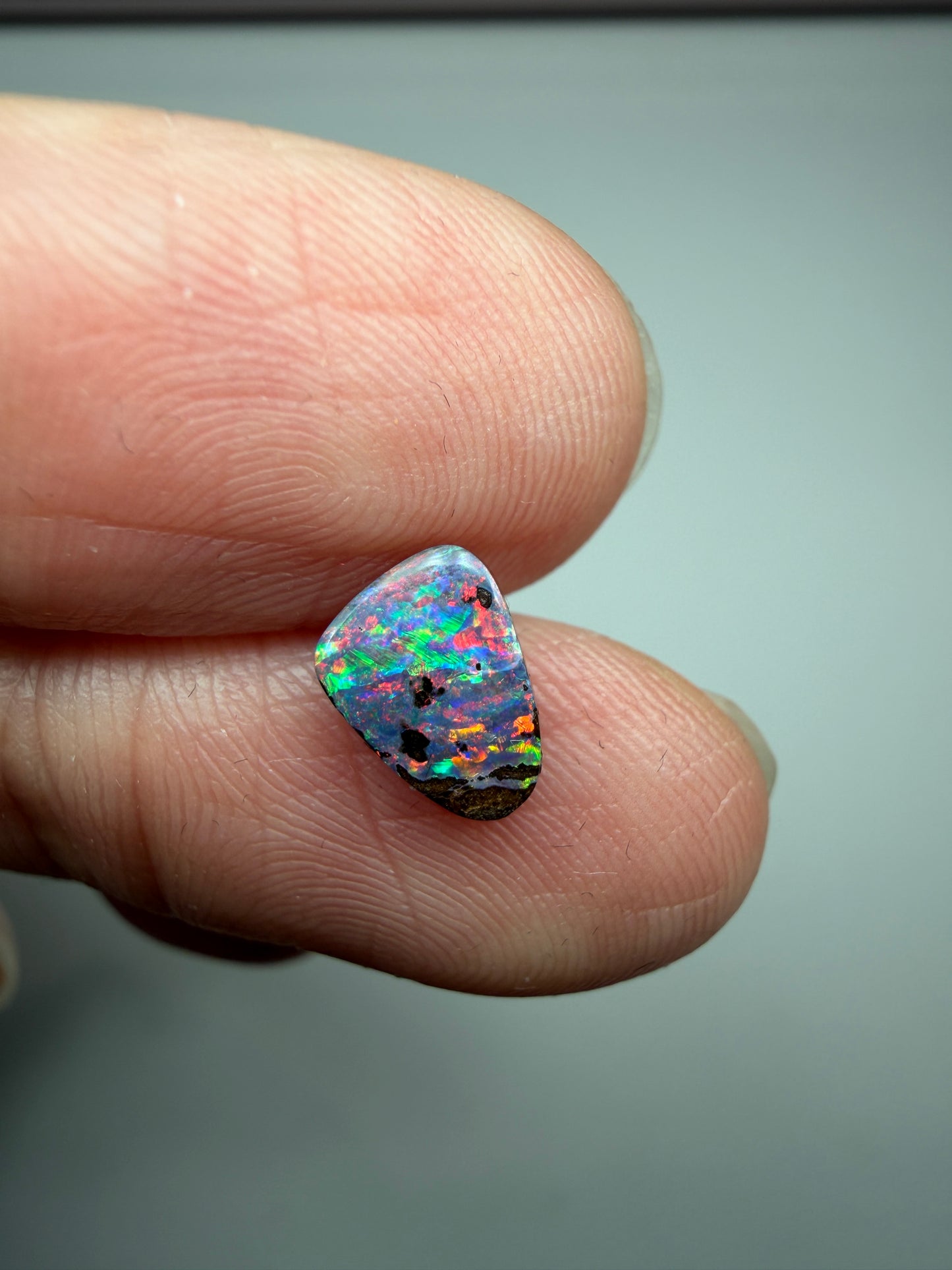 Red Display. Solid Boulder Opal. 0.98 Ct