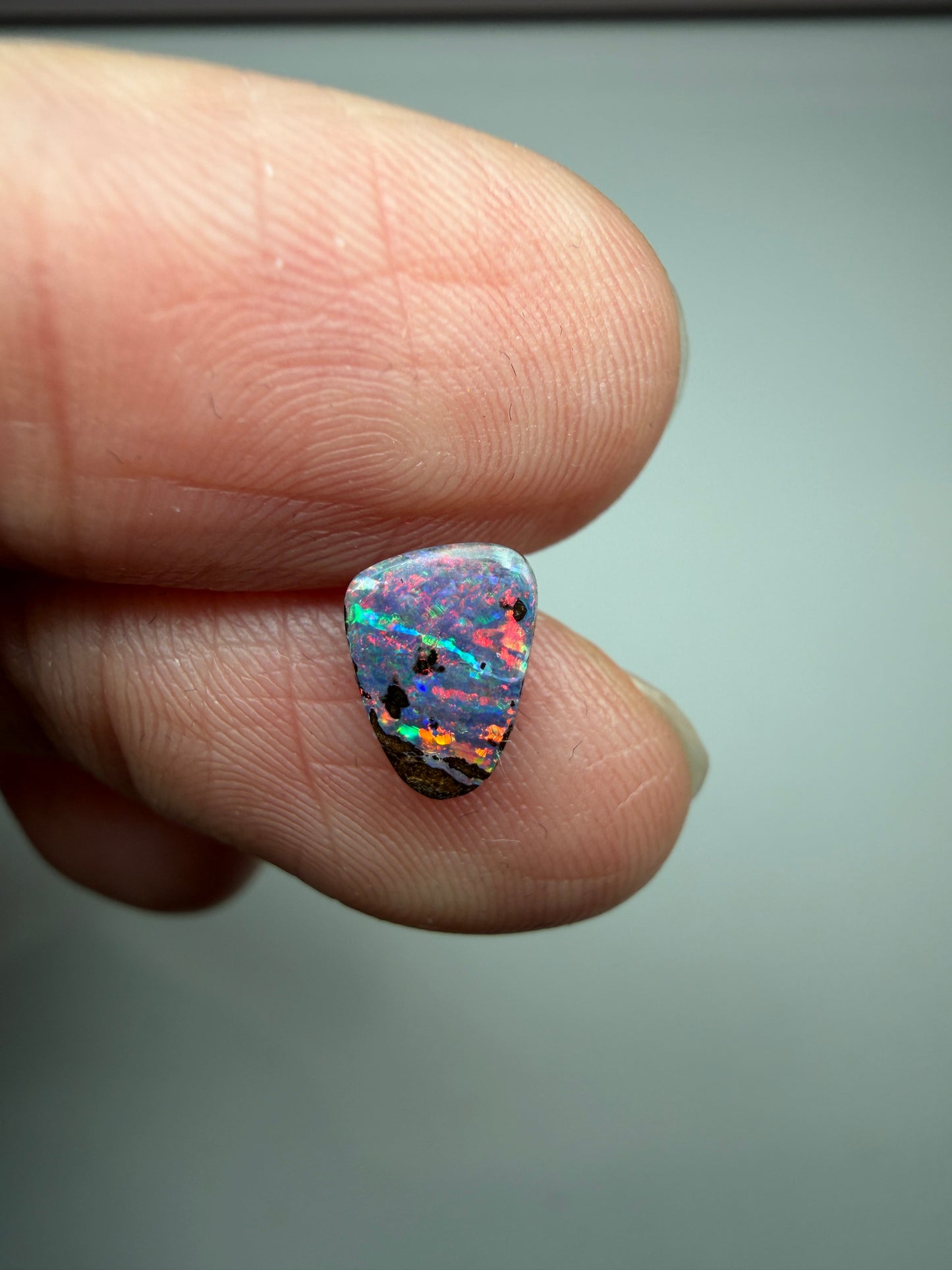 Red Display. Solid Boulder Opal. 0.98 Ct