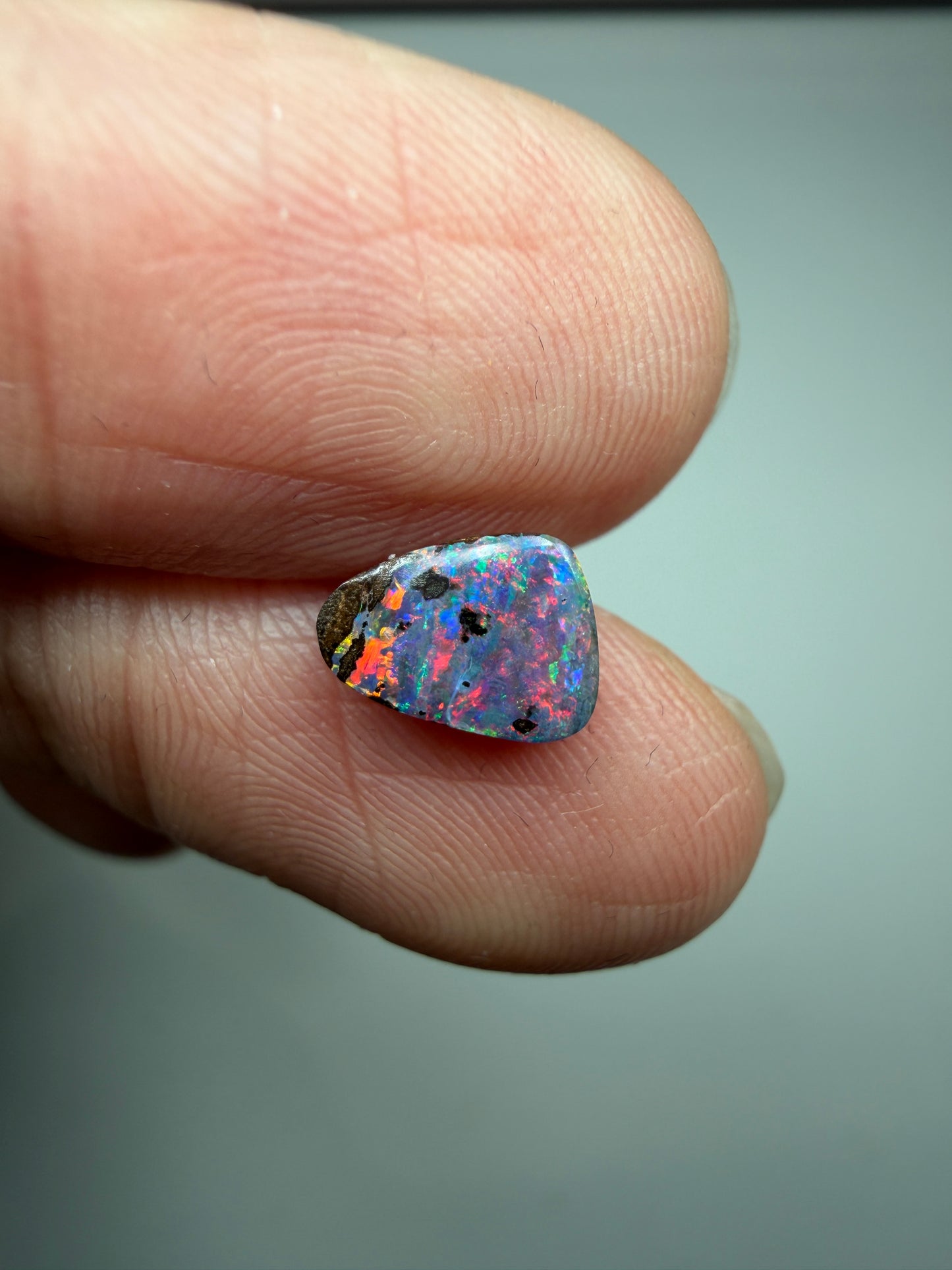 Red Display. Solid Boulder Opal. 0.98 Ct