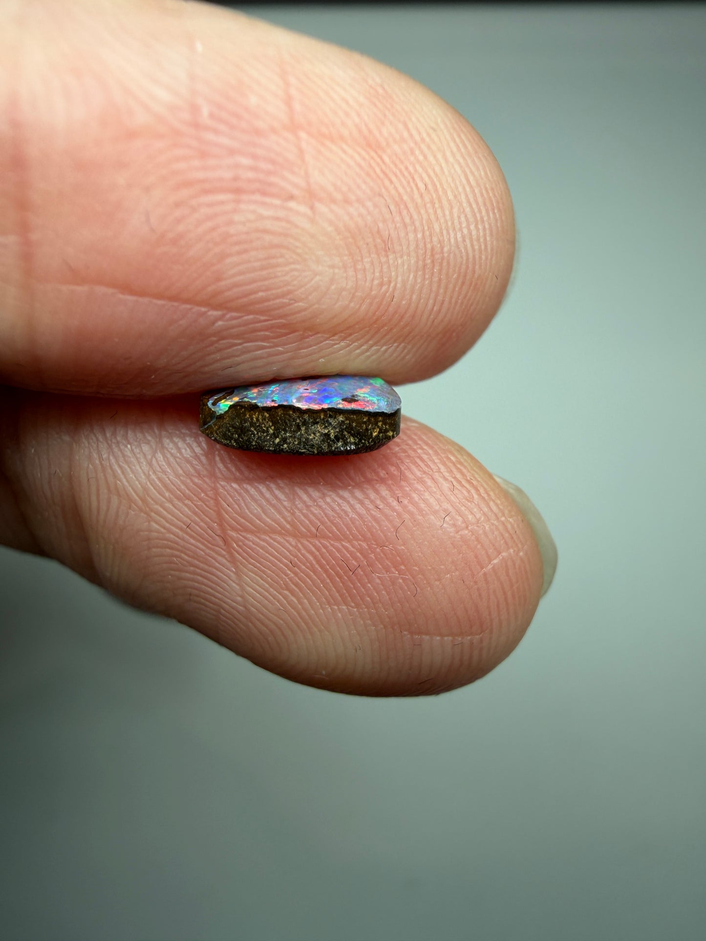 Red Display. Solid Boulder Opal. 0.98 Ct