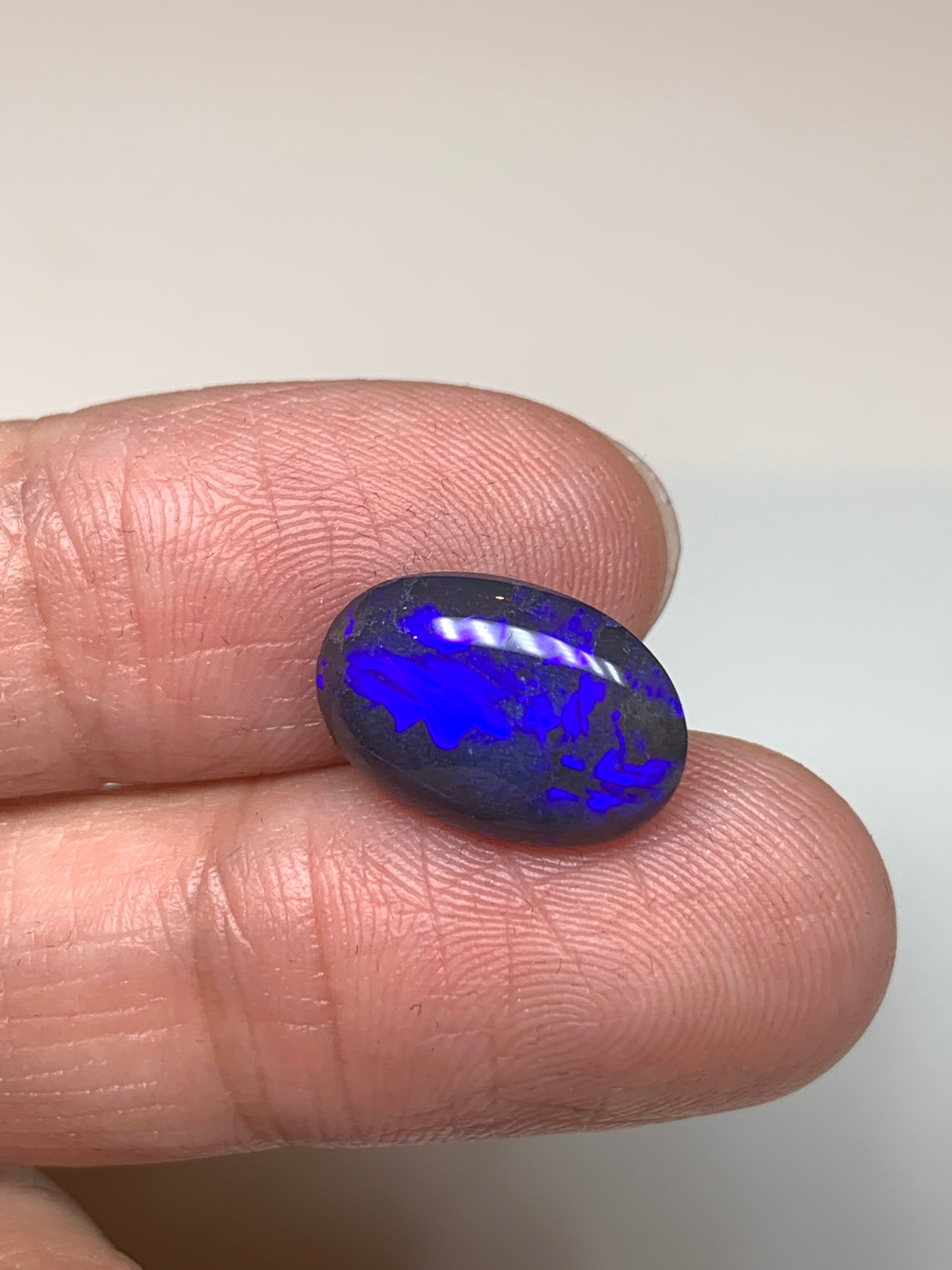 Dazzling Blue Violets. Lightning Ridge Black Opal. 3.33 Ct
