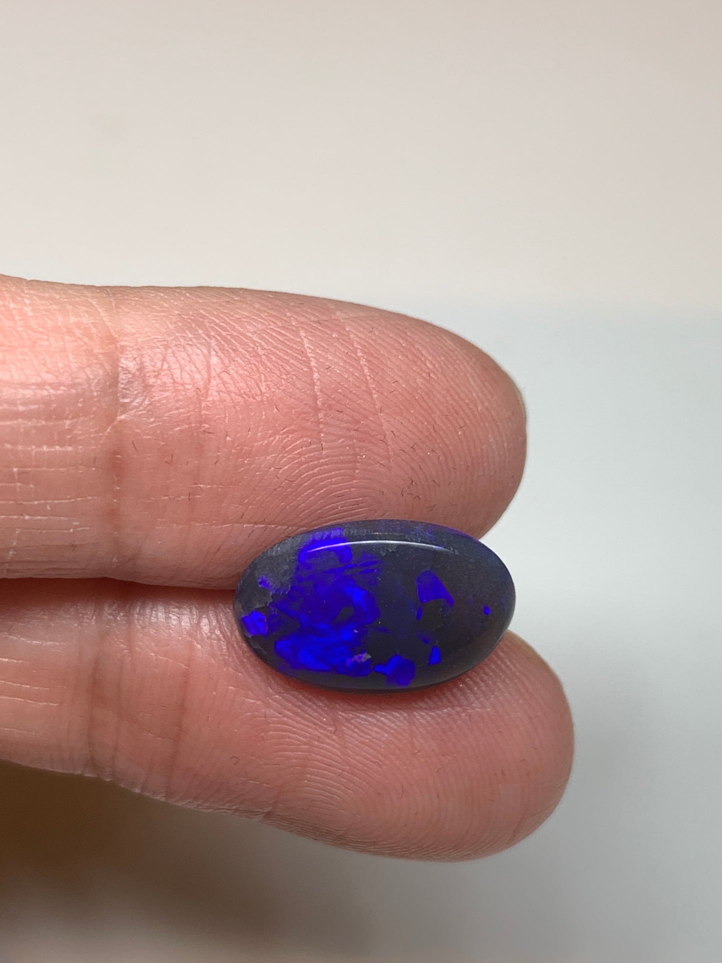 Dazzling Blue Violets. Lightning Ridge Black Opal. 3.33 Ct