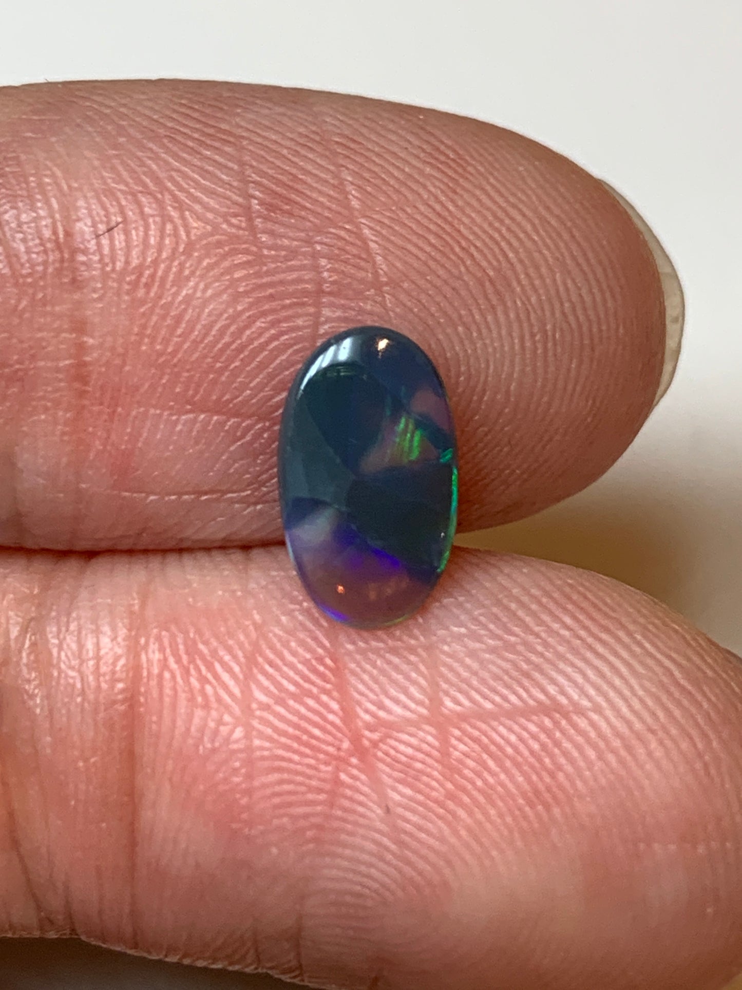 Flashy Green. Lightning Ridge Black Opal. 0.54 Ct