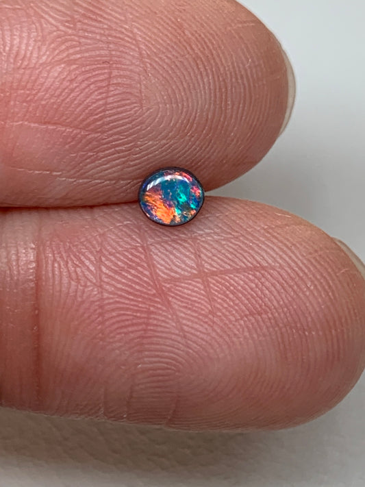 Red Head Cutie. Lightning Ridge Doublet Black Opal. 0.19 Ct