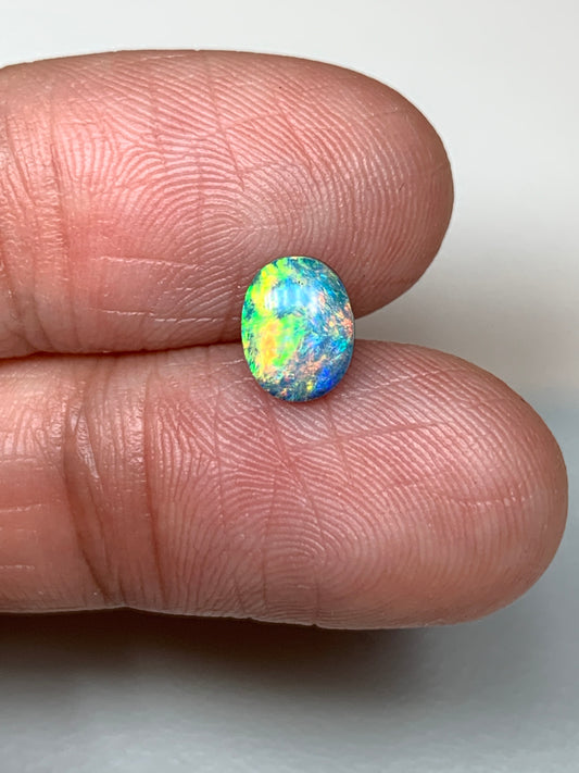 Citrus Zinger. Lightning Ridge Doublet Black Opal. 0.72 Ct