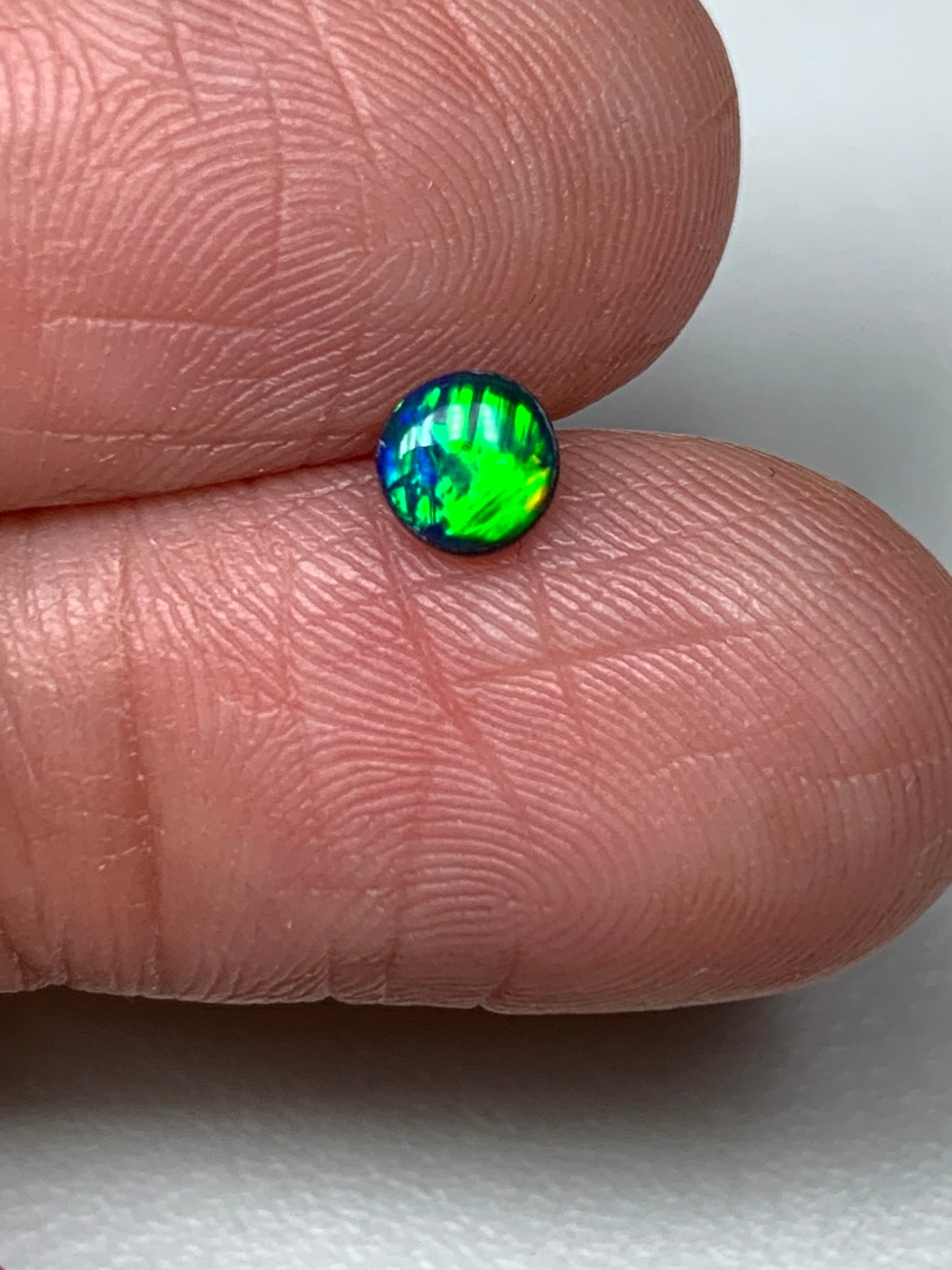 Emerald Light. Lightning Ridge Doublet Black Opal. 0.27 Ct