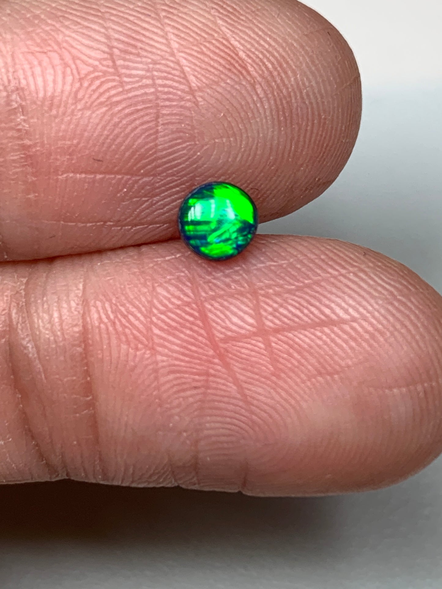 Emerald Light. Lightning Ridge Doublet Black Opal. 0.27 Ct