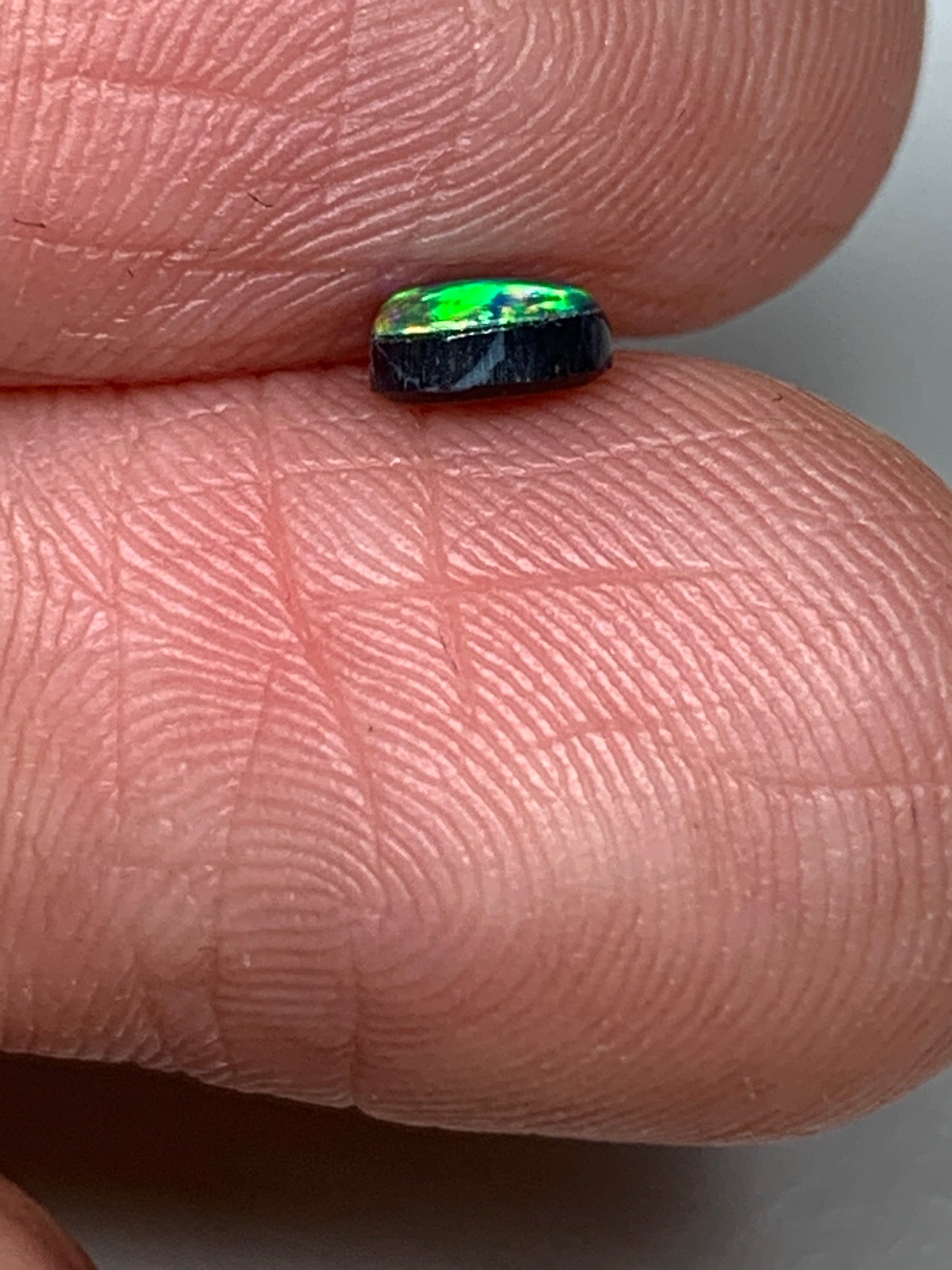 Emerald Light. Lightning Ridge Doublet Black Opal. 0.27 Ct