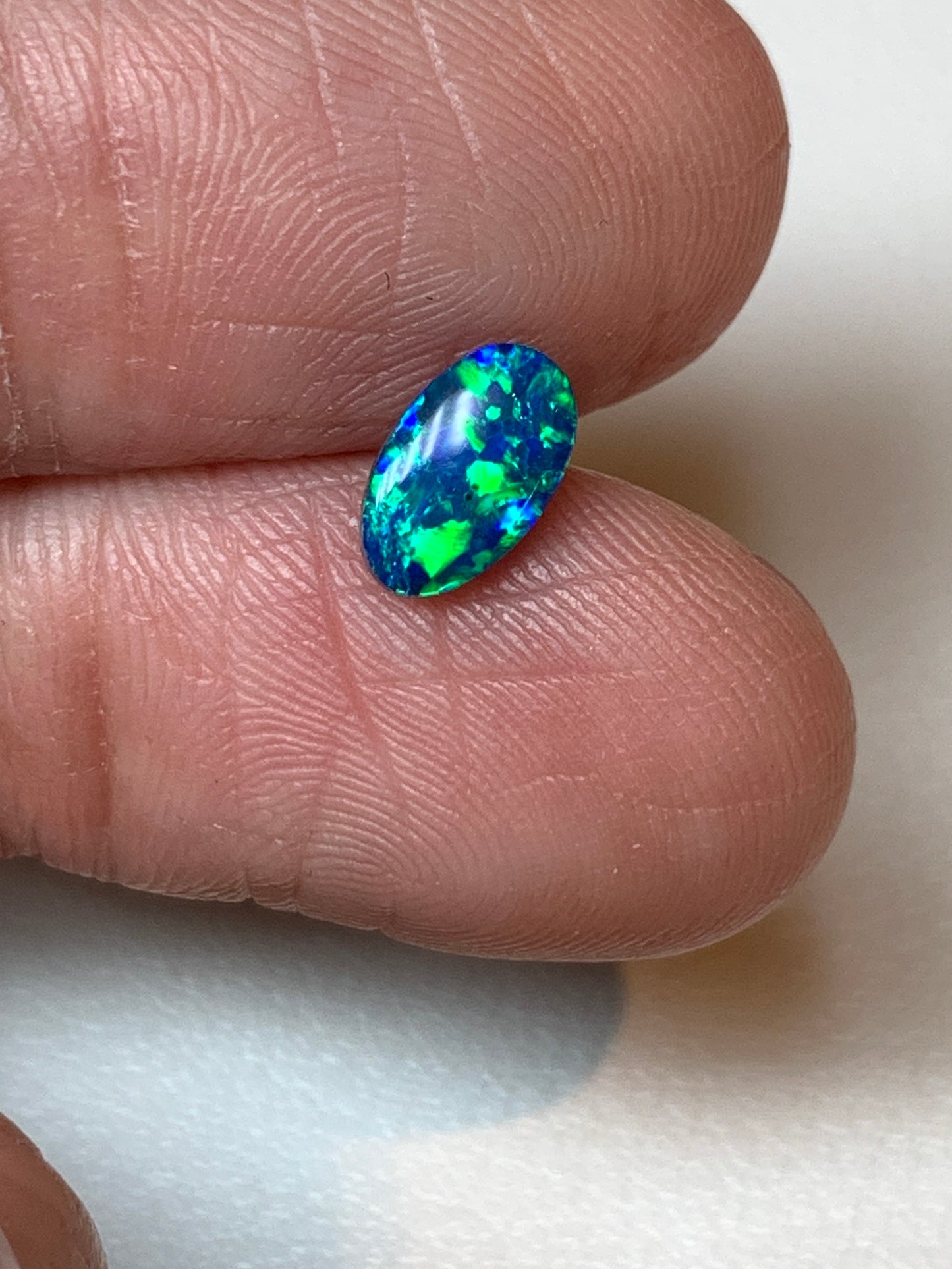 Green Spangles. Lightning Ridge Doublet Black Opal. 0.50 Ct