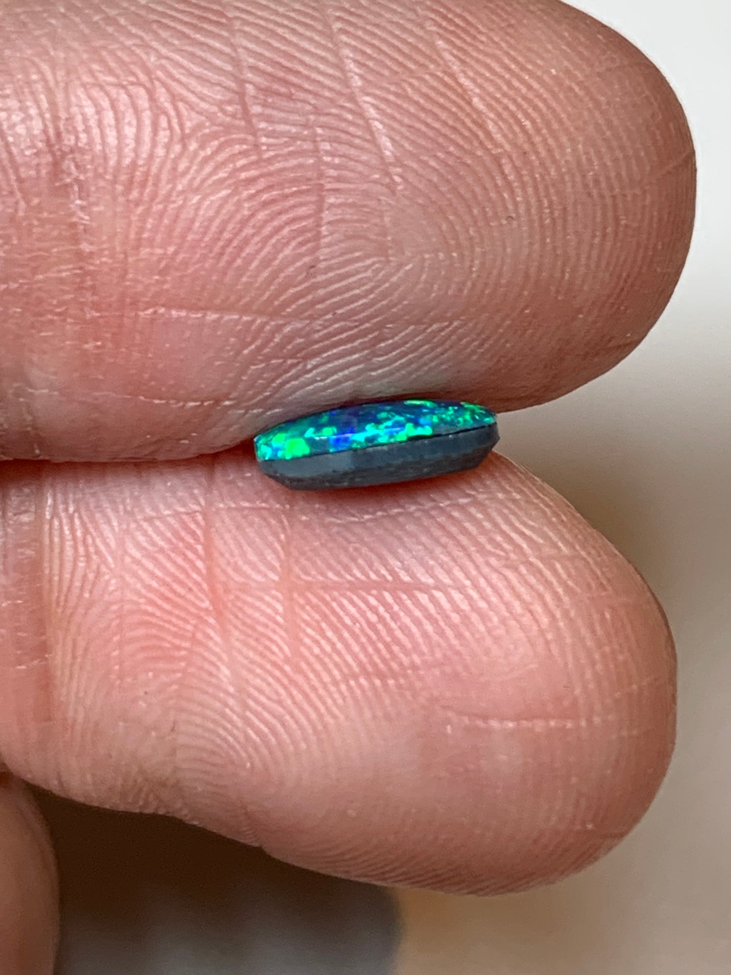 Green Spangles. Lightning Ridge Doublet Black Opal. 0.50 Ct