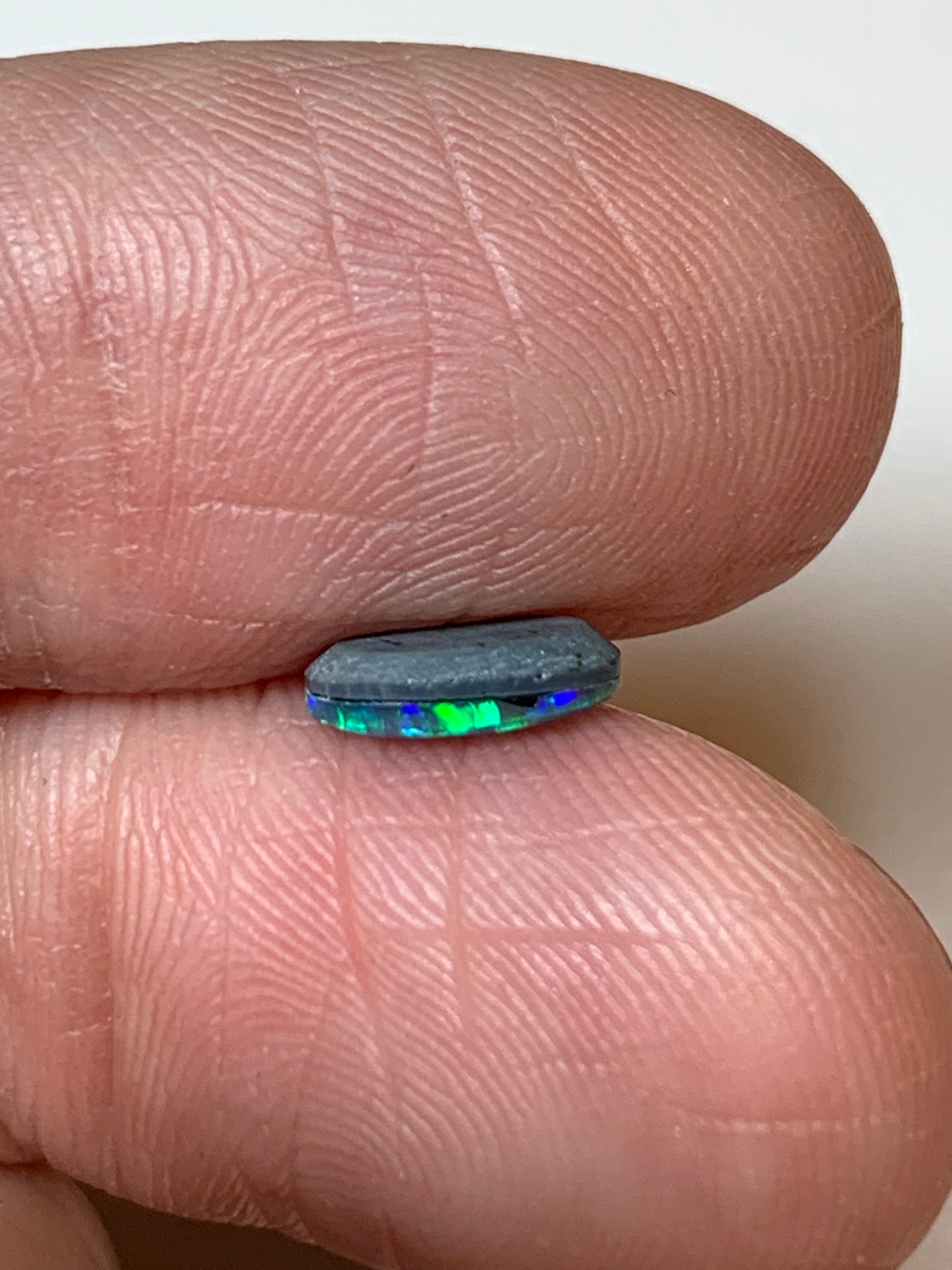 Green Spangles. Lightning Ridge Doublet Black Opal. 0.50 Ct