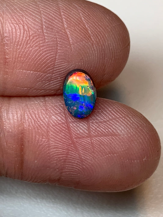 Flower Garden. Lightning Ridge Doublet Black Opal. 0.59 Ct