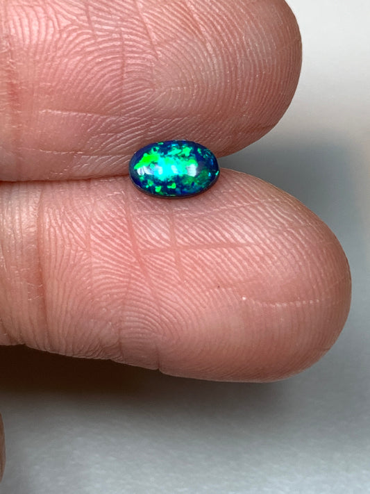 Green Sparkles. Lightning Ridge Doublet Black Opal. 0.31 Ct