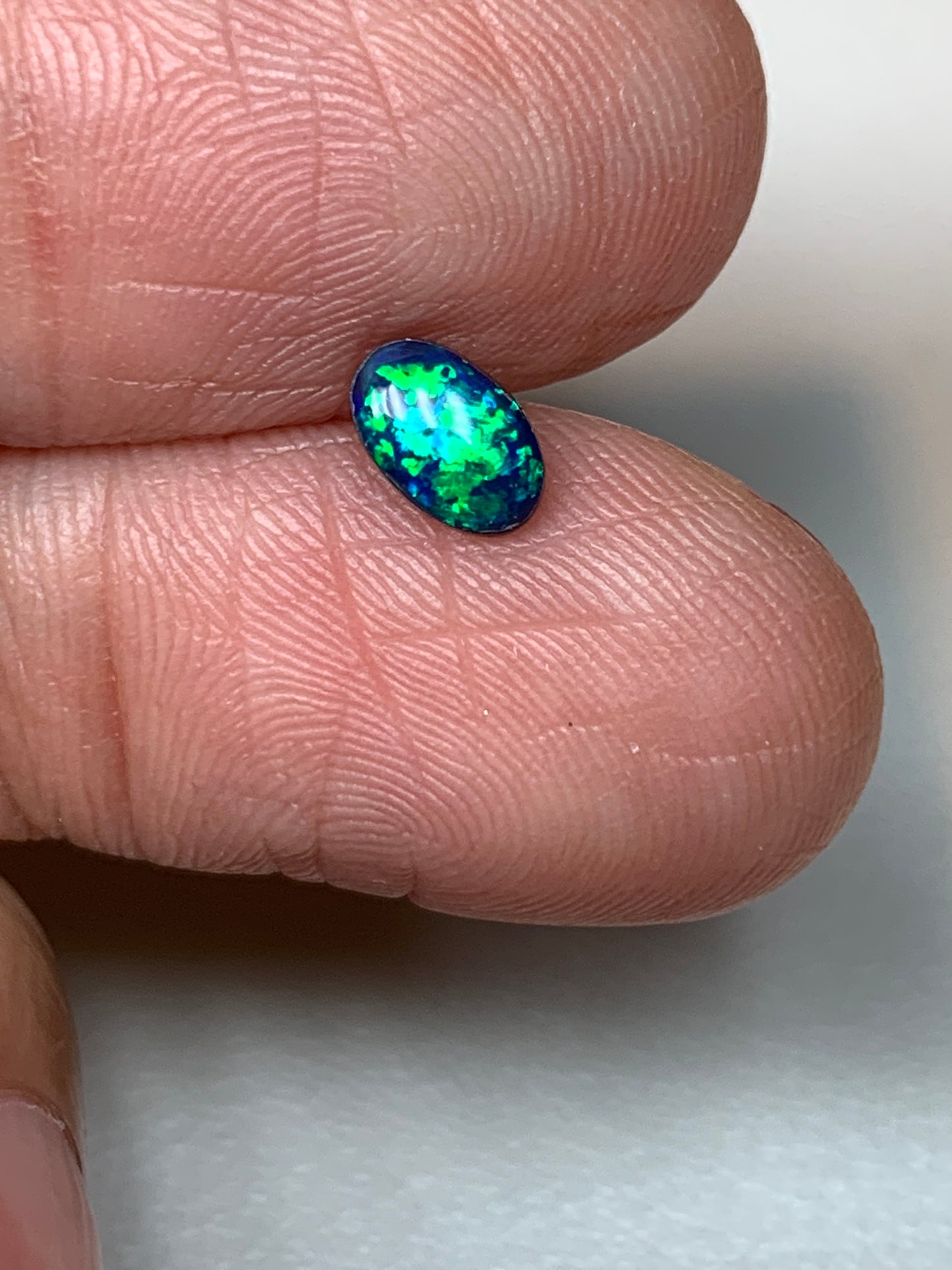 Green Sparkles. Lightning Ridge Doublet Black Opal. 0.31 Ct