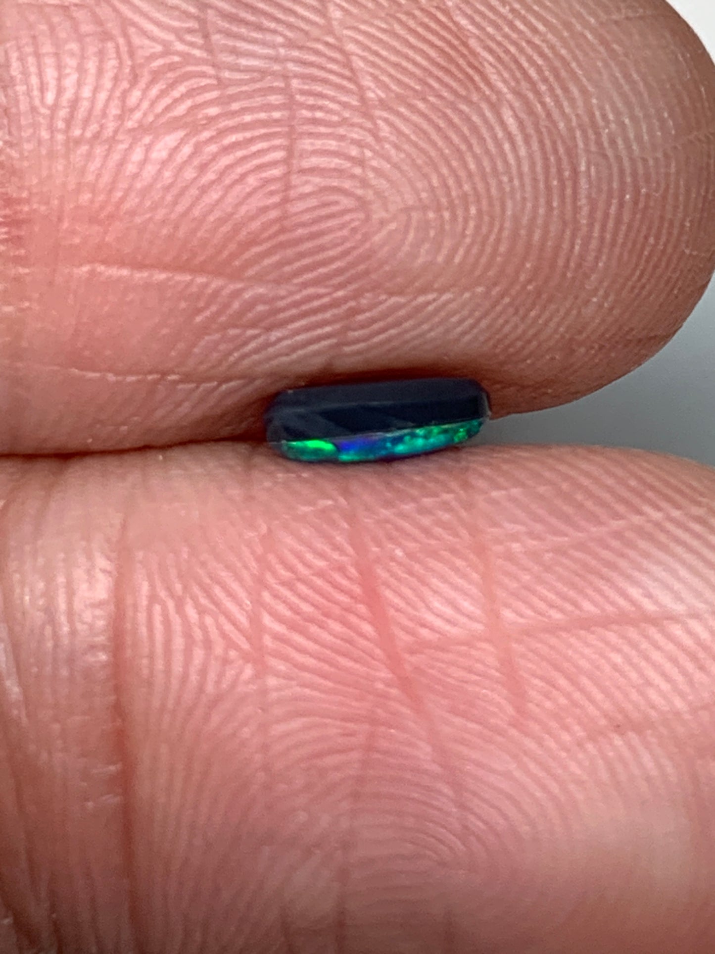 Green Sparkles. Lightning Ridge Doublet Black Opal. 0.31 Ct